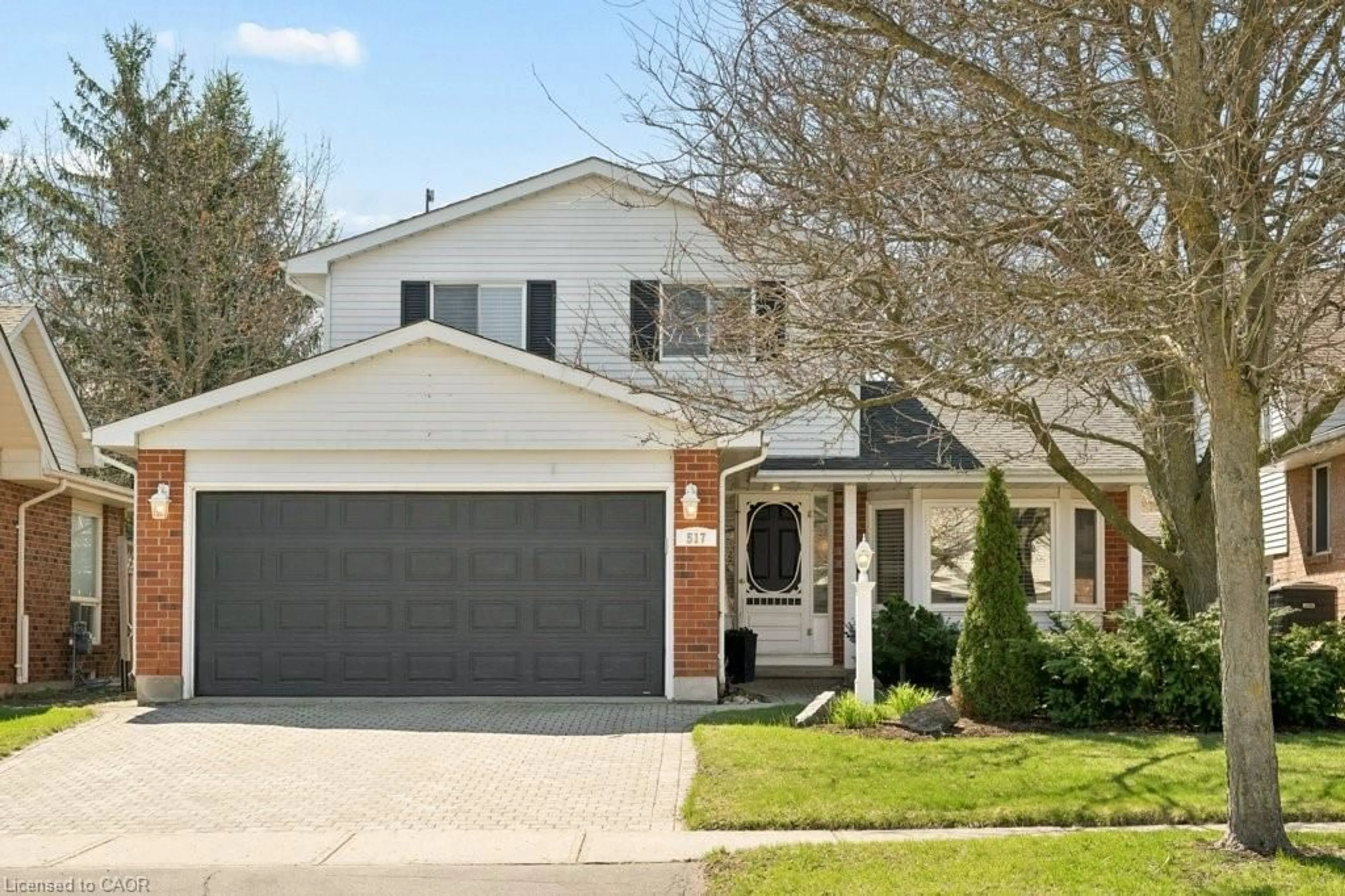 Home with brick exterior material, street for 517 Westfield Dr, Waterloo Ontario N2T 2C7