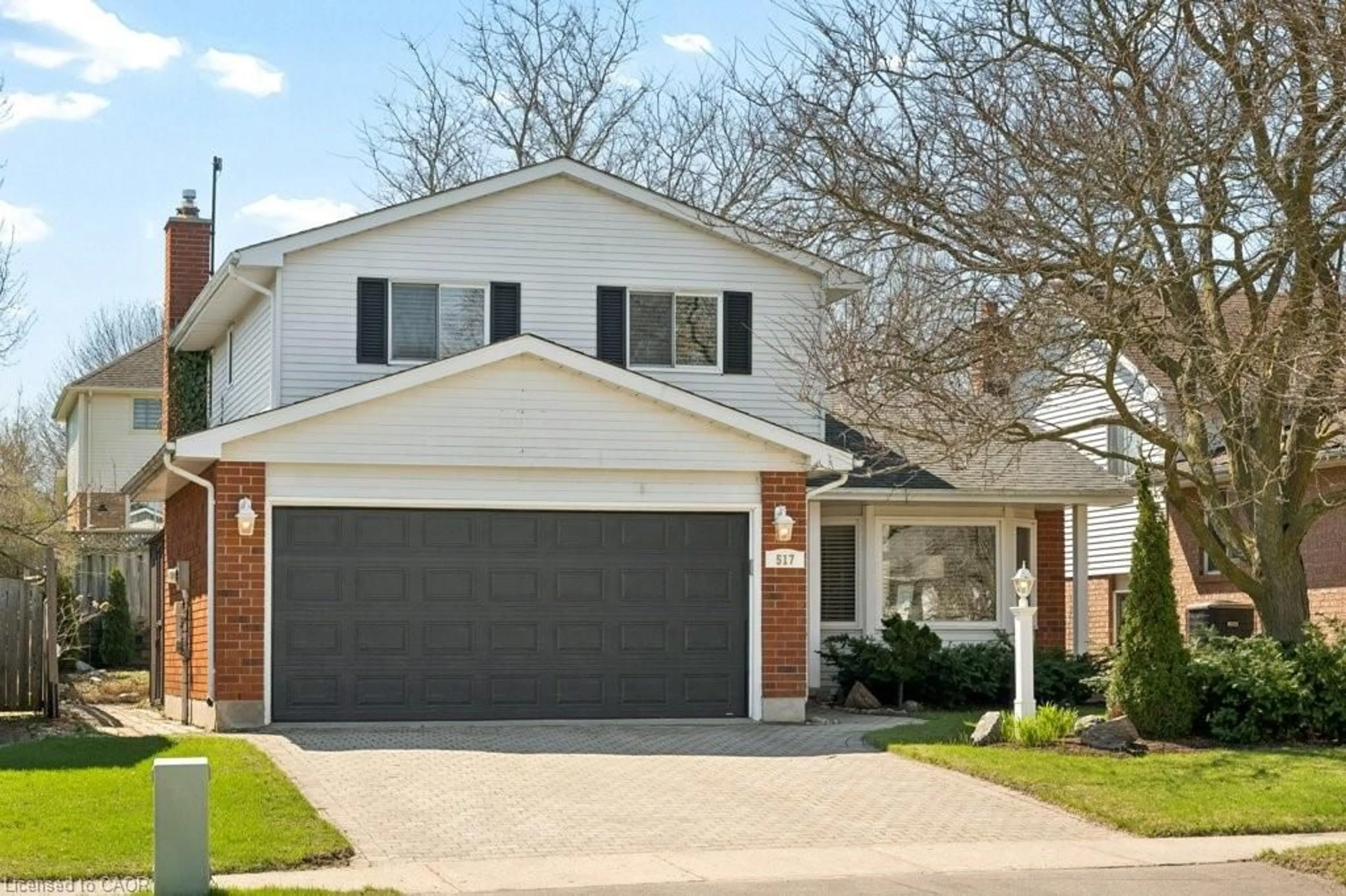 Home with brick exterior material, street for 517 Westfield Dr, Waterloo Ontario N2T 2C7