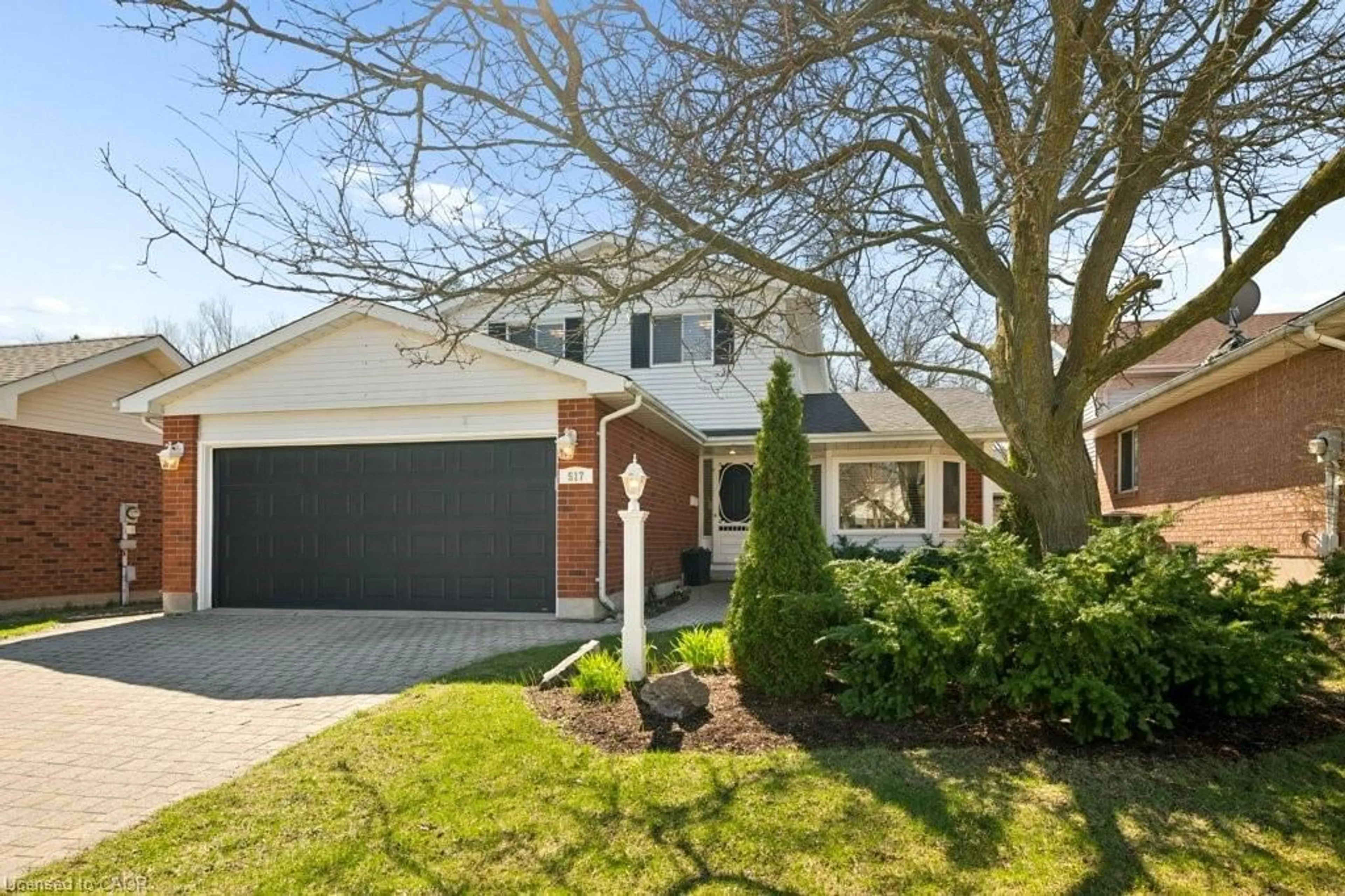 Home with brick exterior material, street for 517 Westfield Dr, Waterloo Ontario N2T 2C7