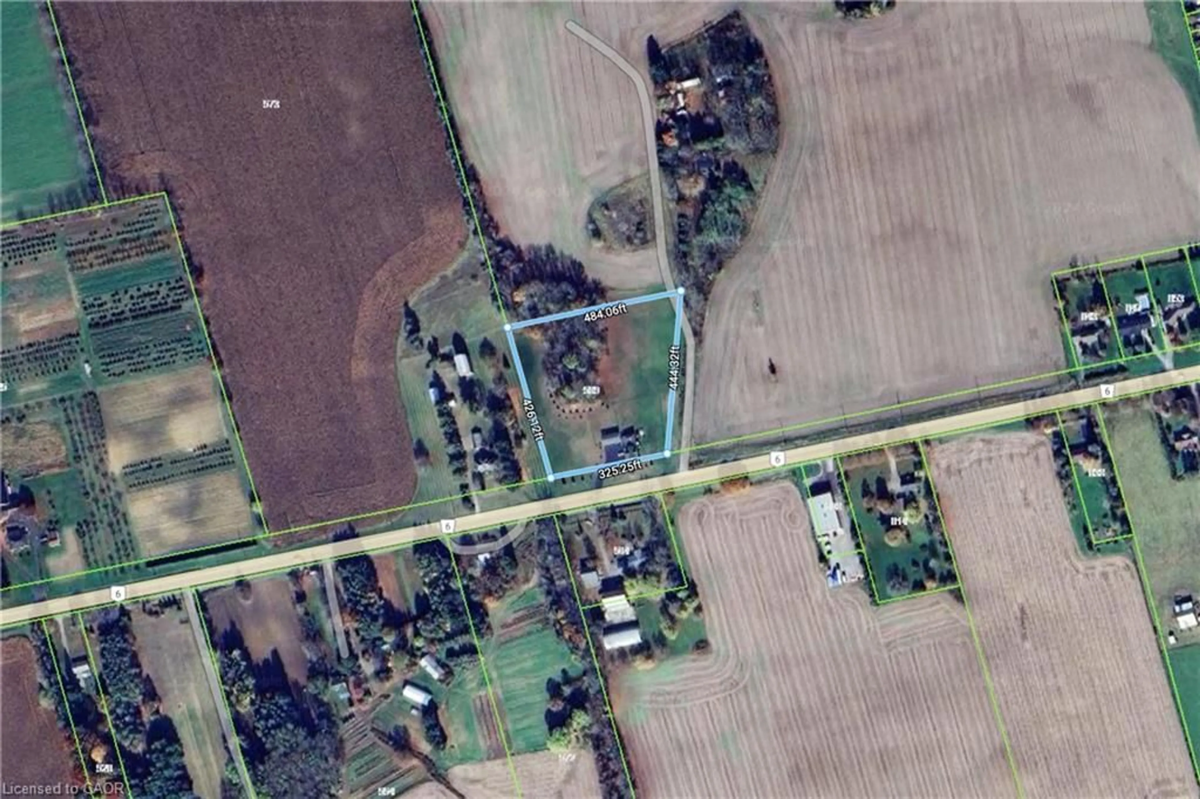 A pic from outside/outdoor area/front of a property/back of a property/a pic from drone, street for 589 Highway 6, Port Dover Ontario N0A 1N2