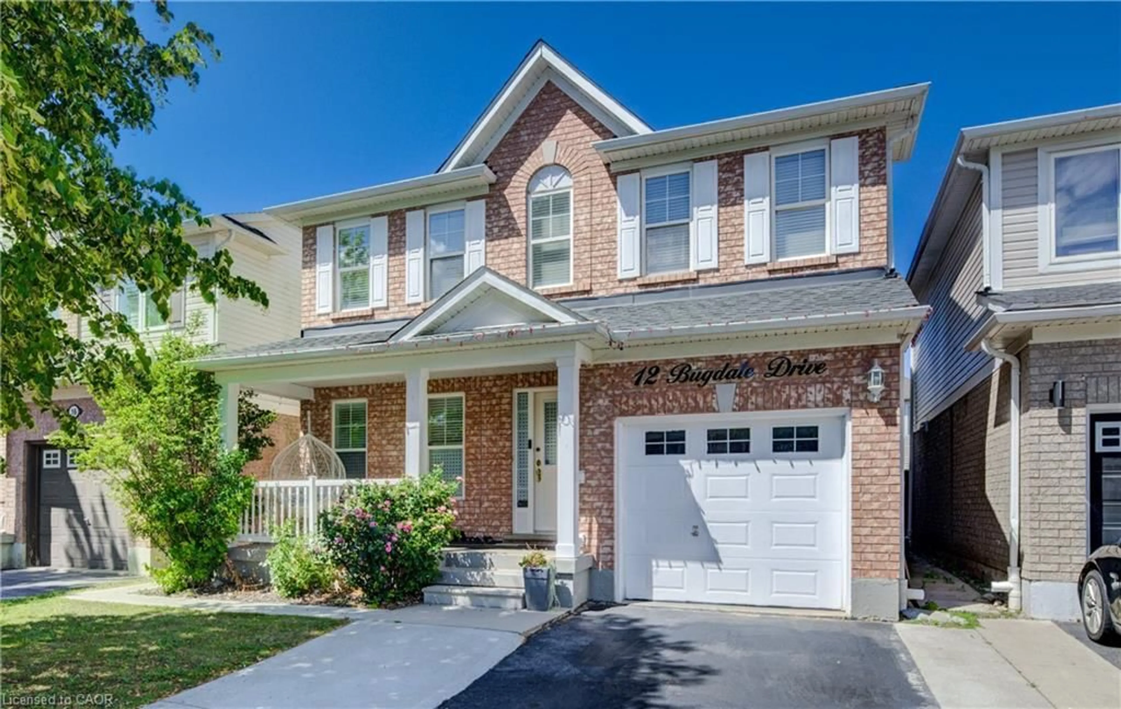Home with brick exterior material, street for 12 Bugdale Dr, Cambridge Ontario N1T 2K2