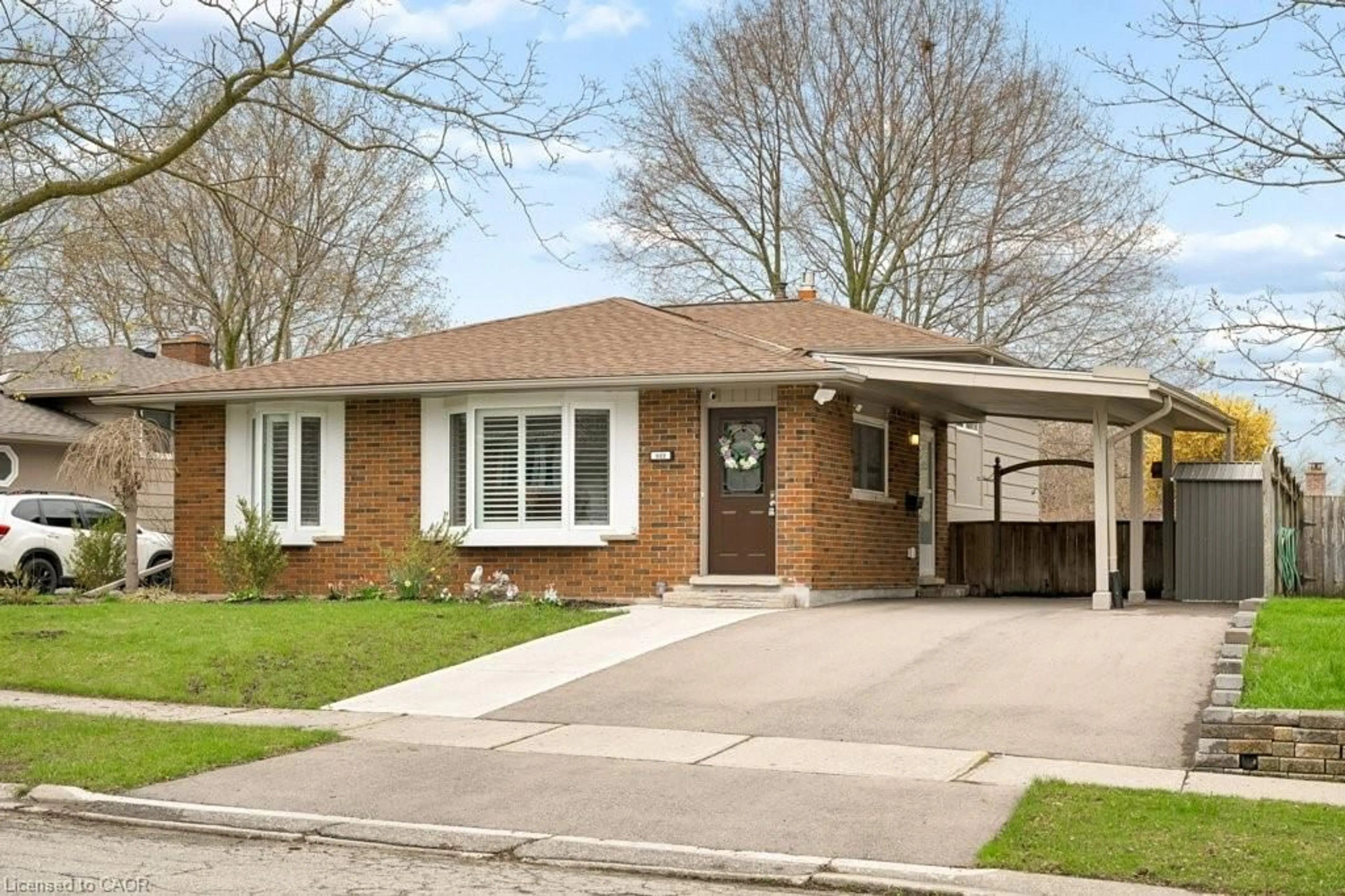 Home with brick exterior material, street for 522 Glendene Cres, Waterloo Ontario N2L 4P4