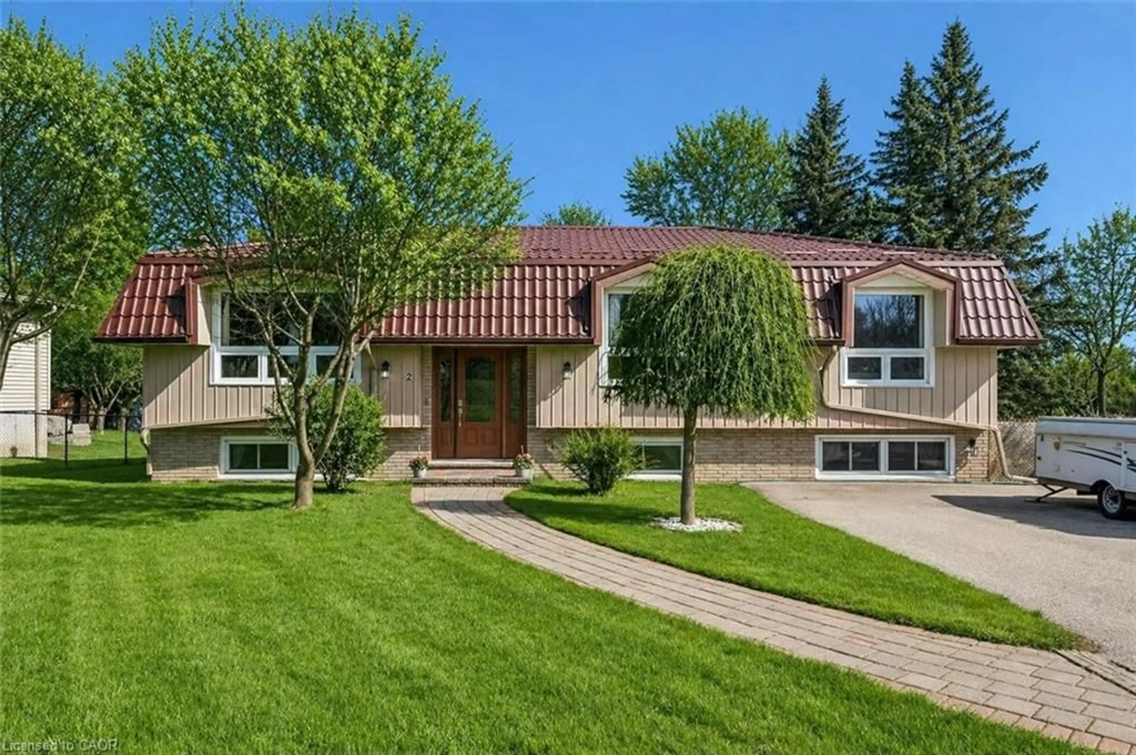 Home with brick exterior material, street for 2 Hamilton Dr, Guelph/Eramosa Ontario N1E 0N9