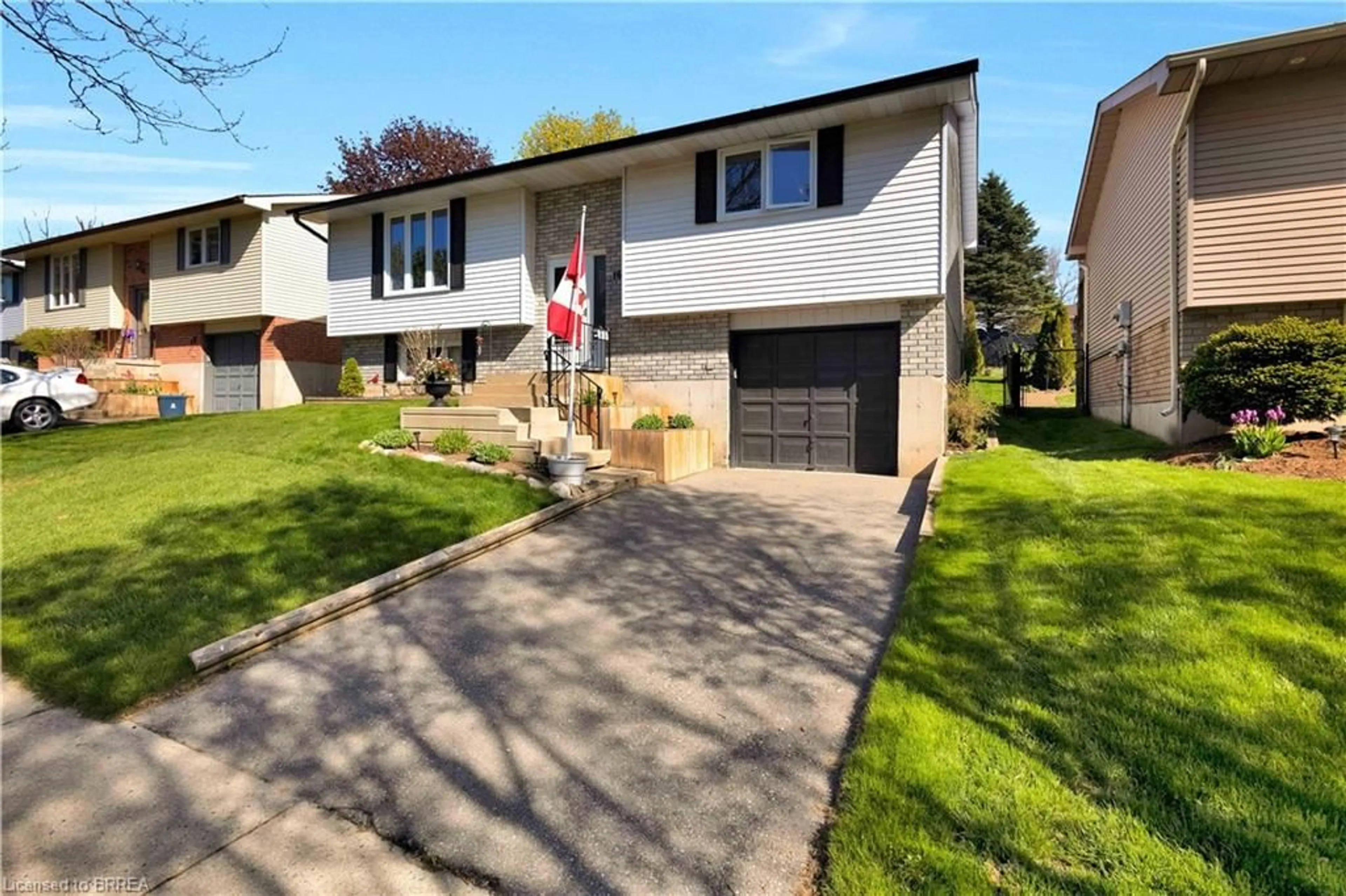 Home with brick exterior material, street for 16 Sandlewood Ave, Brantford Ontario N3V 1C6