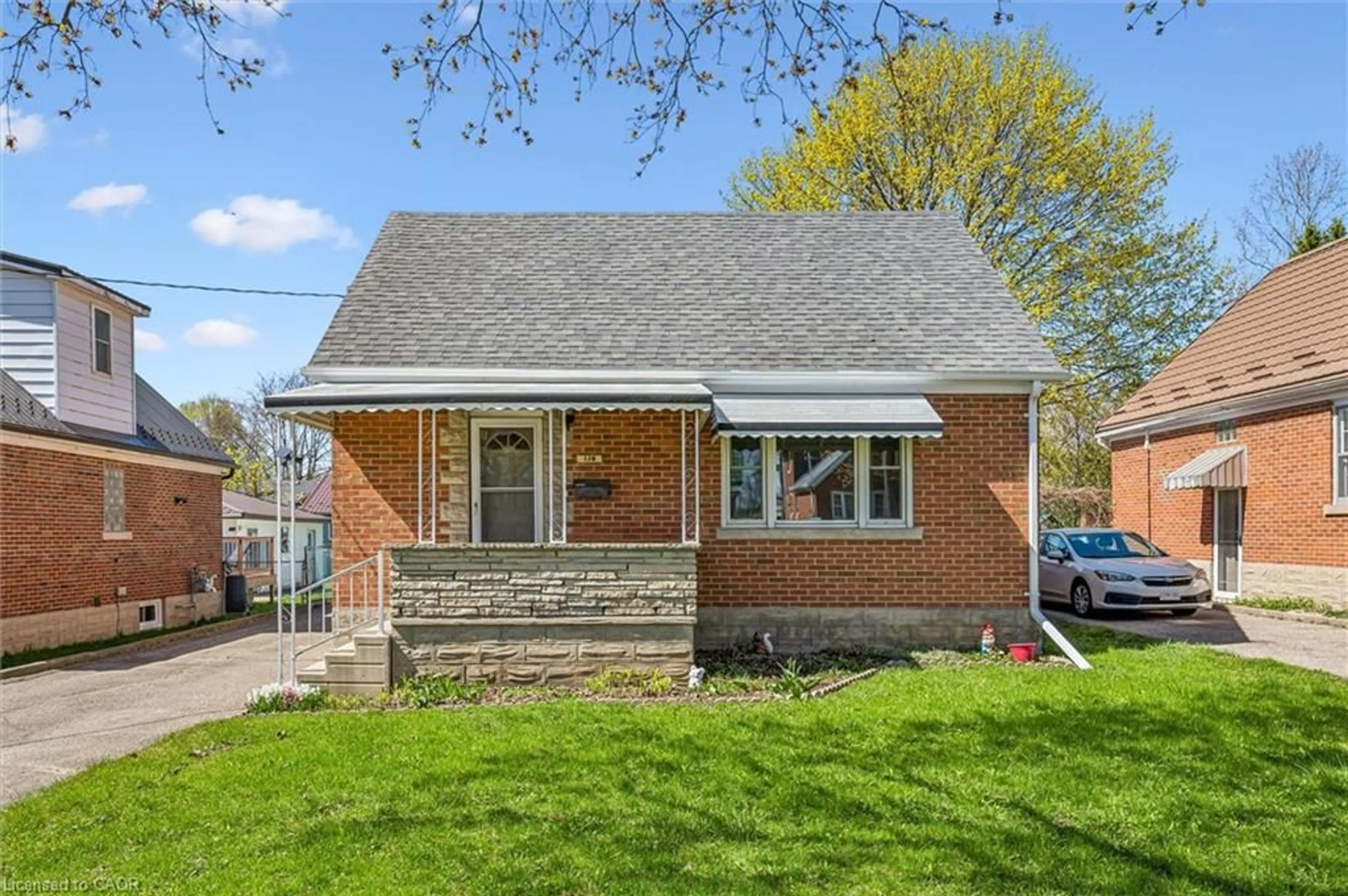 Home with brick exterior material, street for 128 Mausser Ave, Kitchener Ontario N2M 3K5