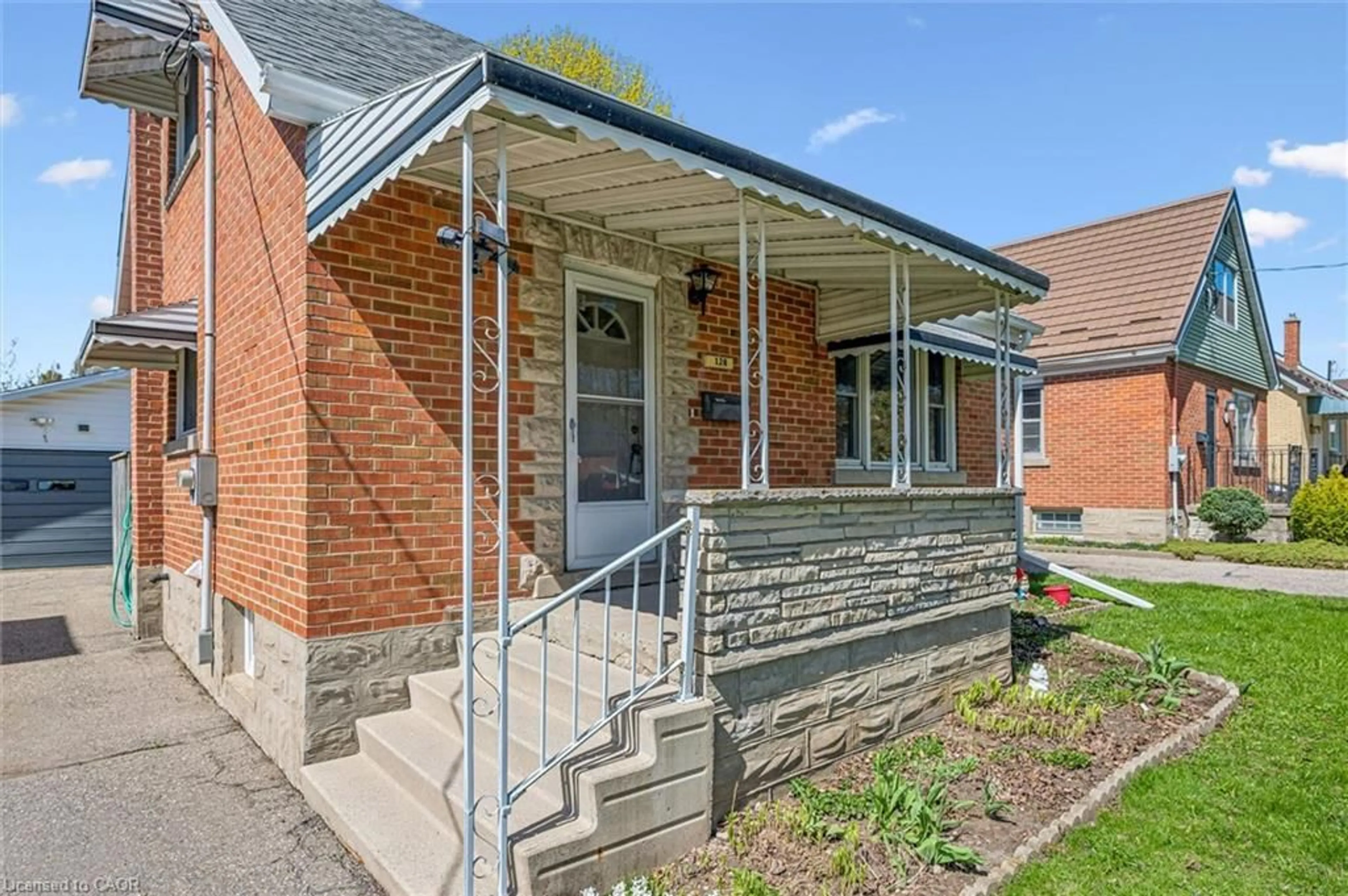 Home with brick exterior material, street for 128 Mausser Ave, Kitchener Ontario N2M 3K5
