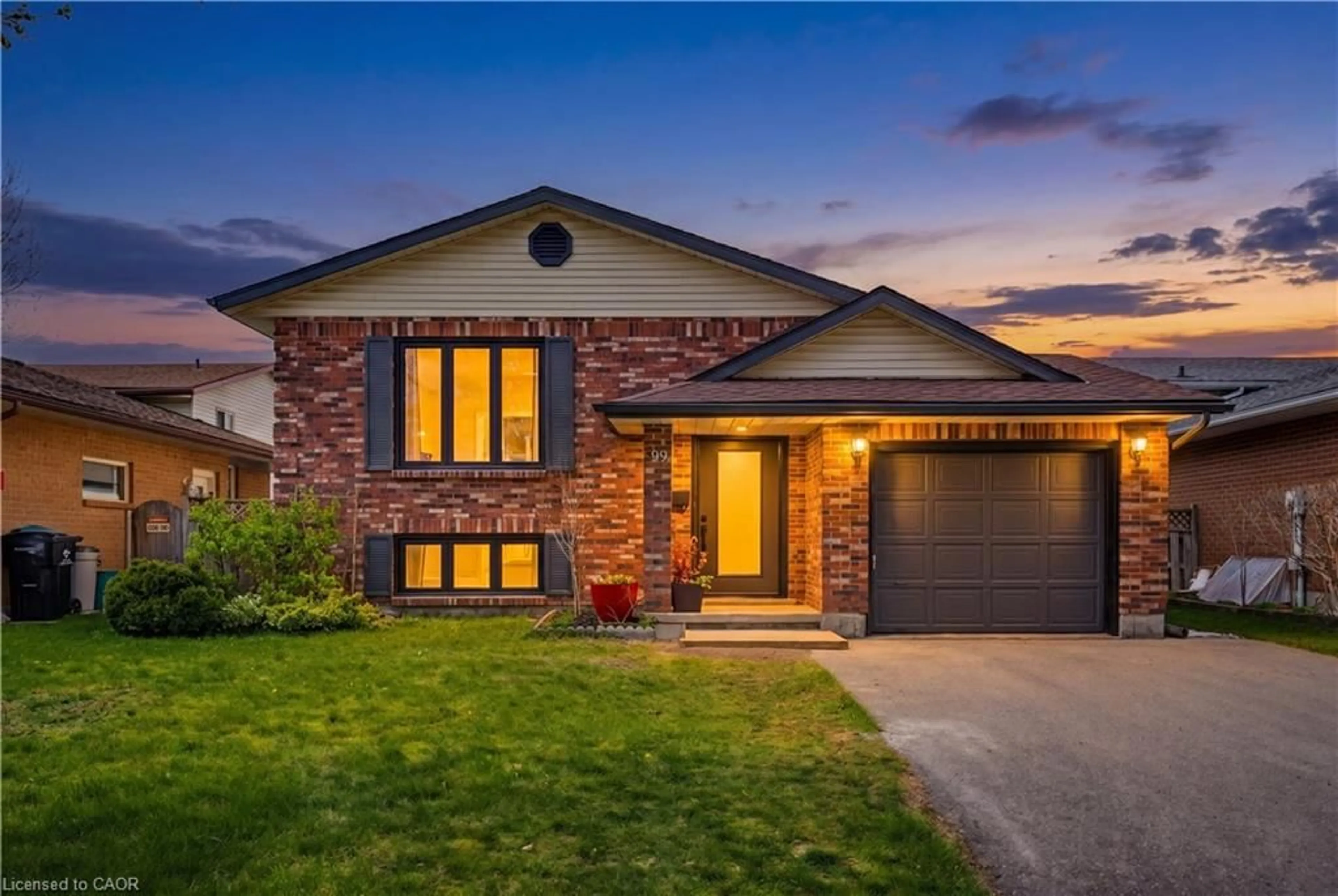 Home with brick exterior material, street for 99 Oakhurst Cres, Kitchener Ontario N2B 3K2