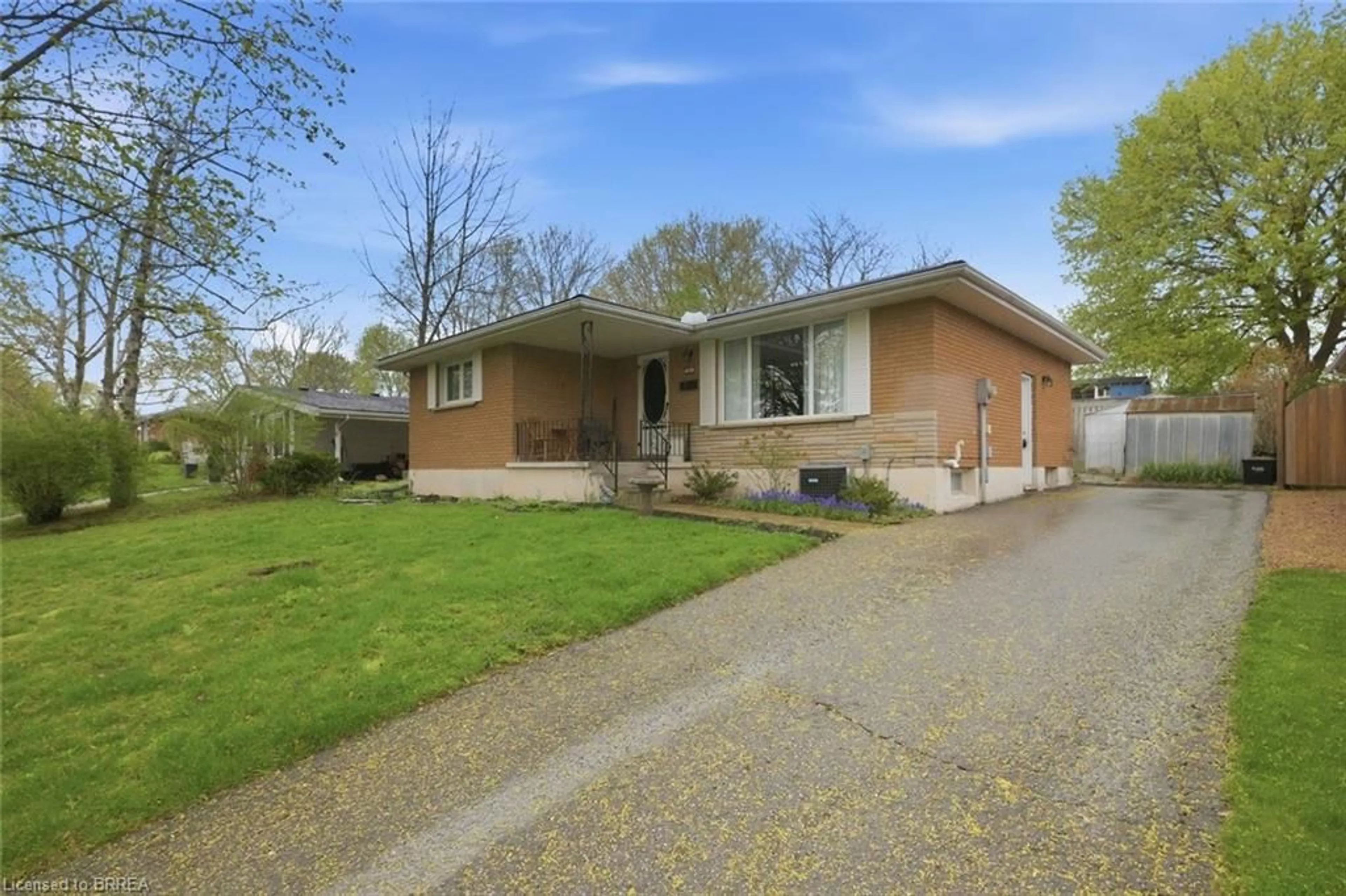 Home with brick exterior material, street for 13 Mackay Ave, Simcoe Ontario N3Y 1C9