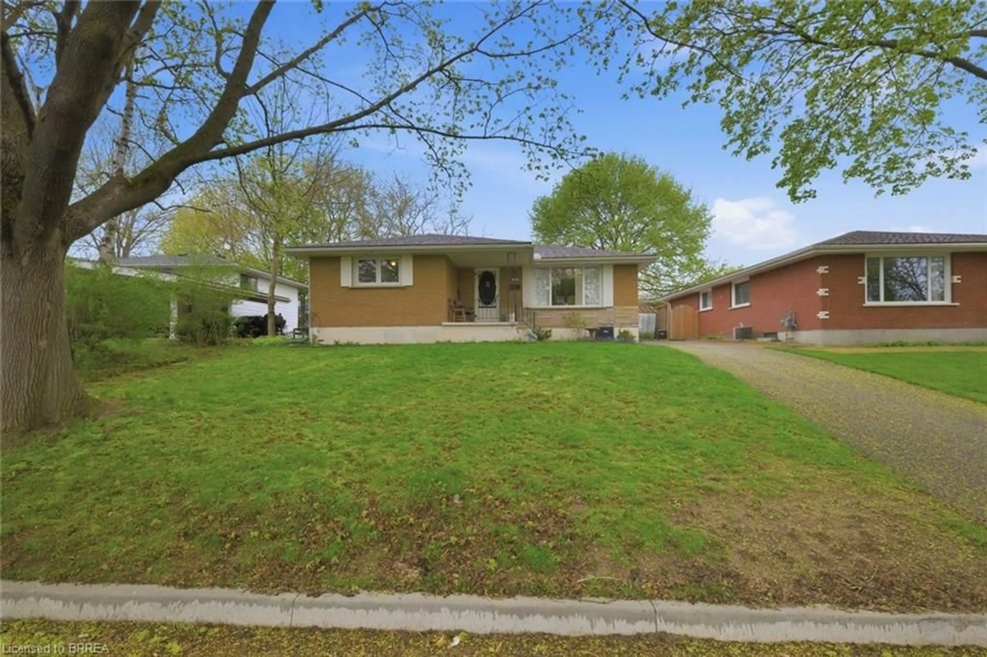Home with brick exterior material, street for 13 Mackay Ave, Simcoe Ontario N3Y 1C9
