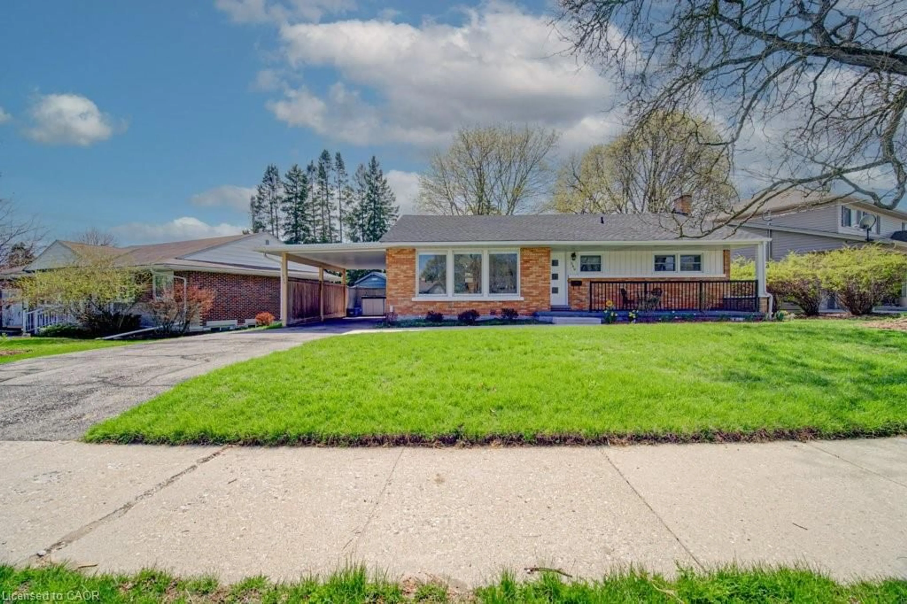 Home with brick exterior material, street for 549 Dunbar Rd, Kitchener Ontario N2M 2X1