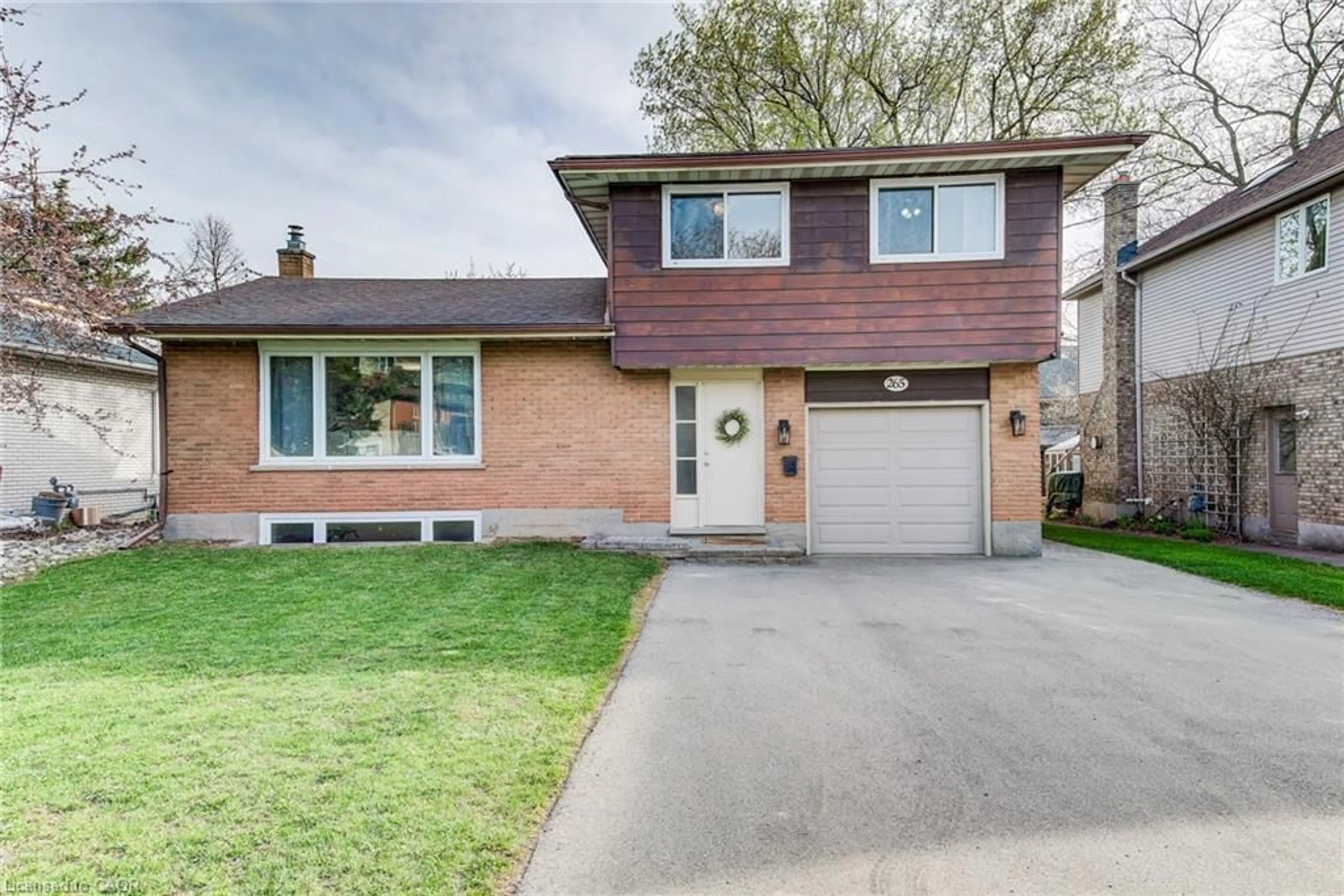 Home with brick exterior material, street for 265 Thaler Ave, Kitchener Ontario N2A 1R7