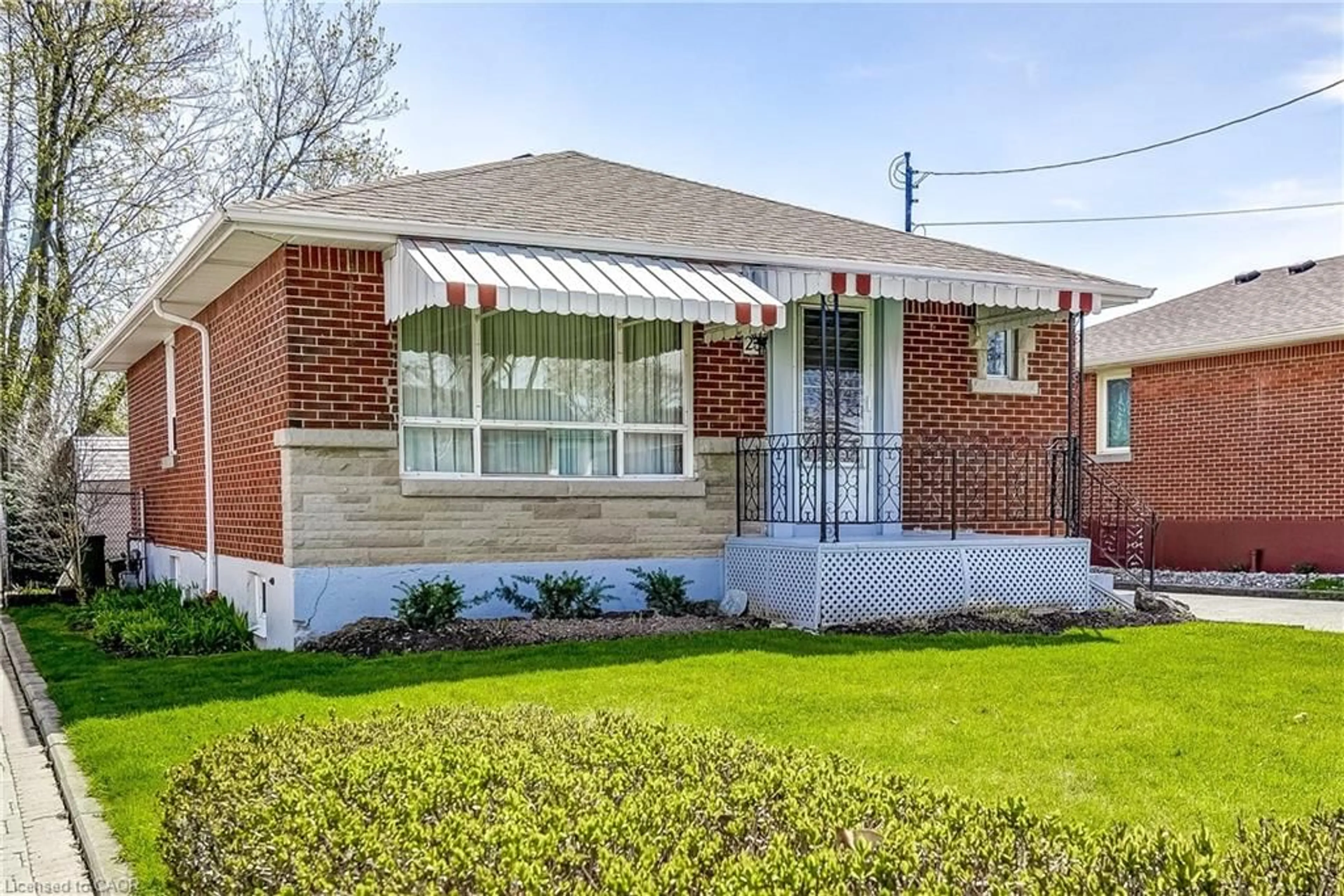 Home with brick exterior material, street for 23 Fernwood Cres, Hamilton Ontario L8T 3L2