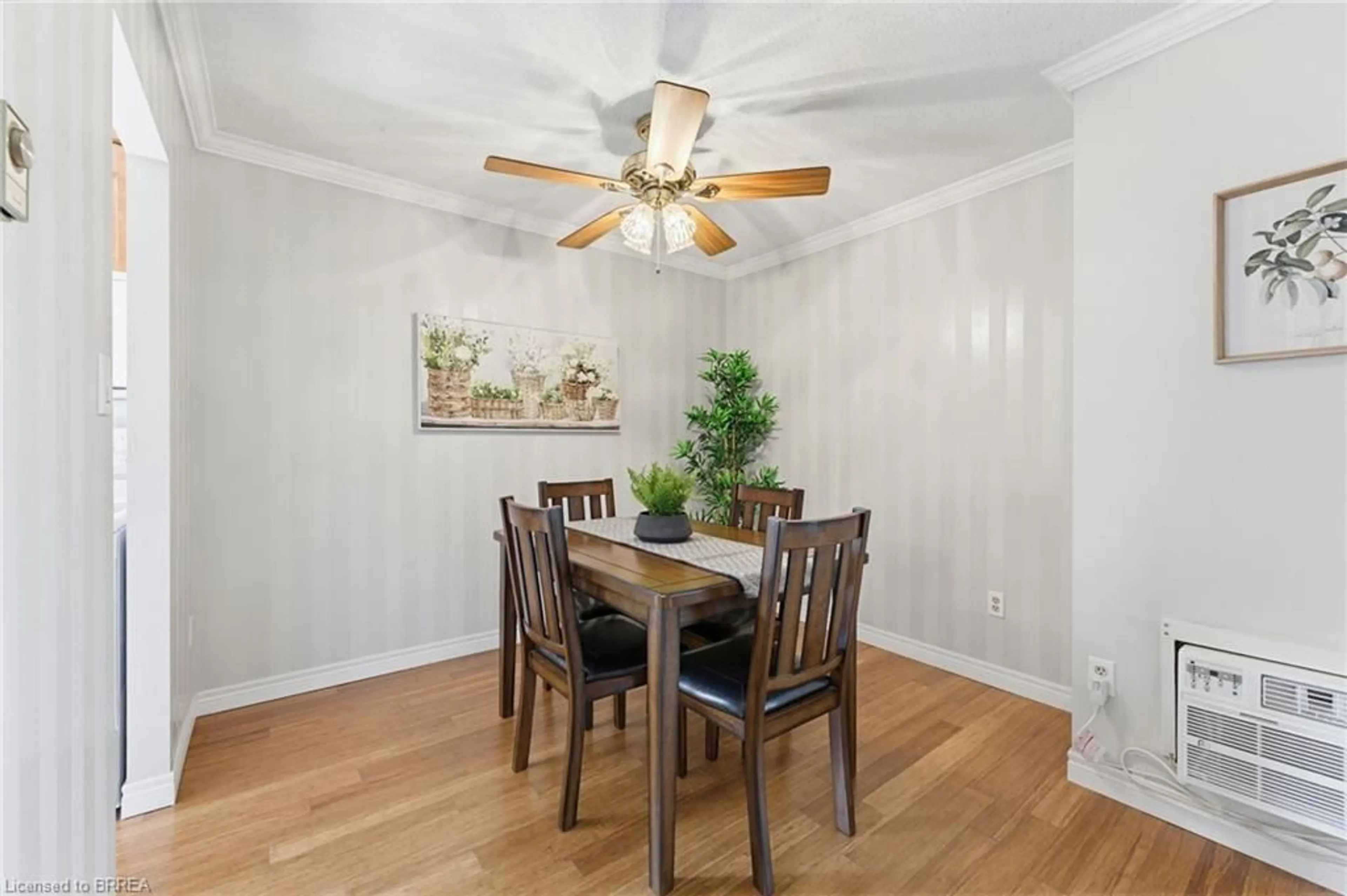 Dining room, wood/laminate floor for 23 Main St #203, Dundas Ontario L9H 2P7