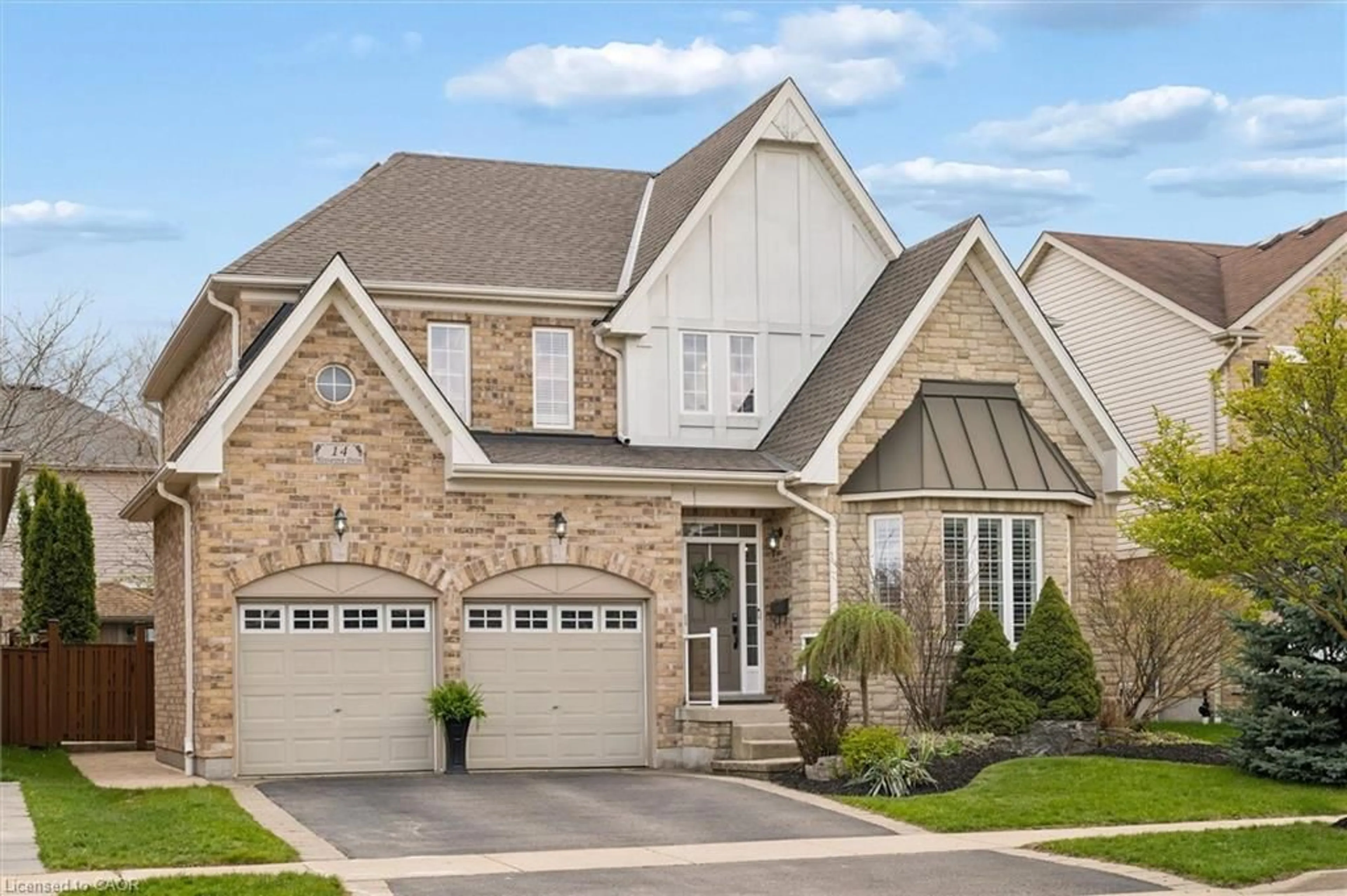 Home with brick exterior material, street for 14 Mossgrove Dr, Kitchener Ontario N2P 2Y8