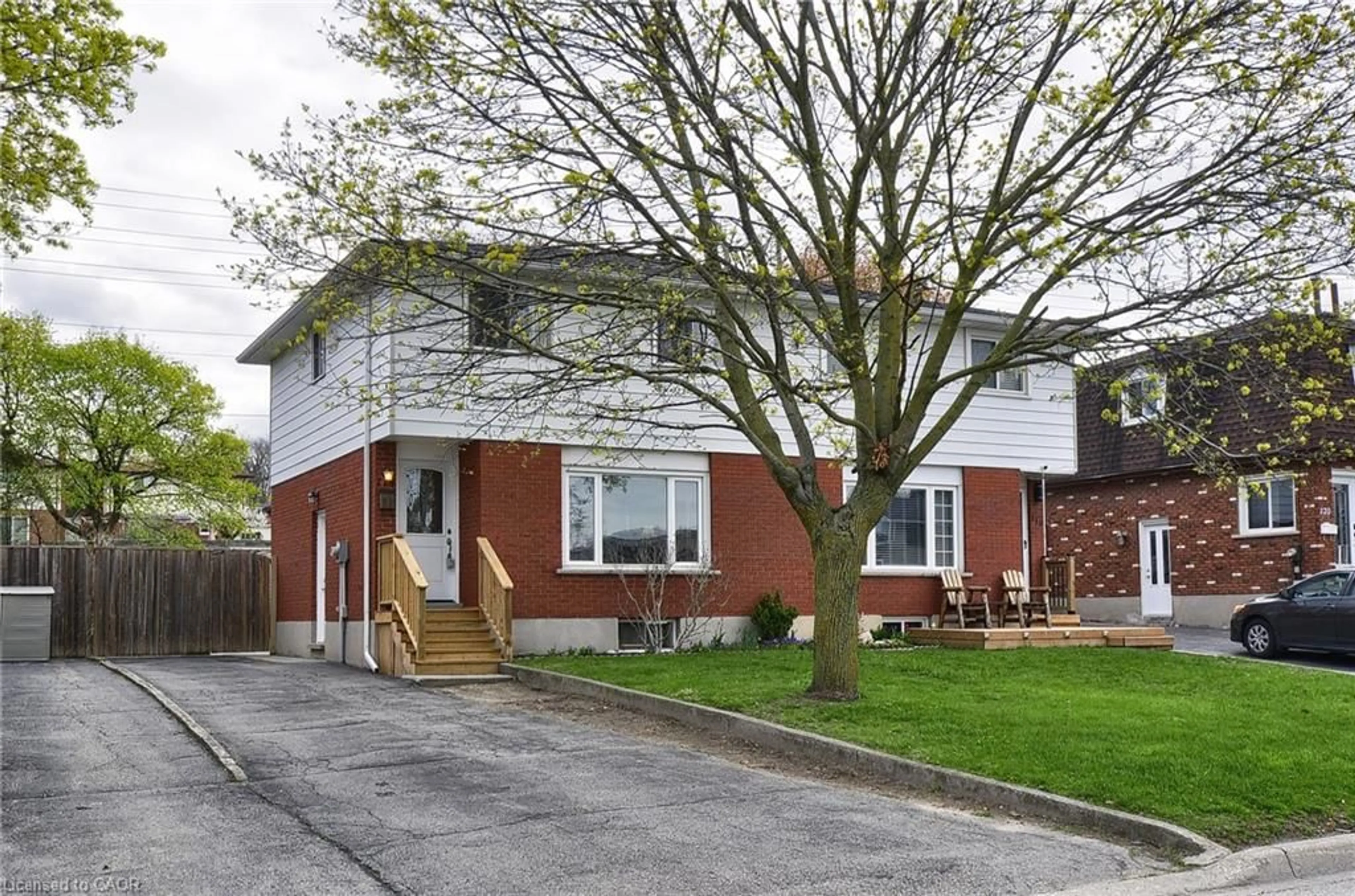 Home with brick exterior material, street for 114 Bakersfield Dr, Cambridge Ontario N1R 6X6