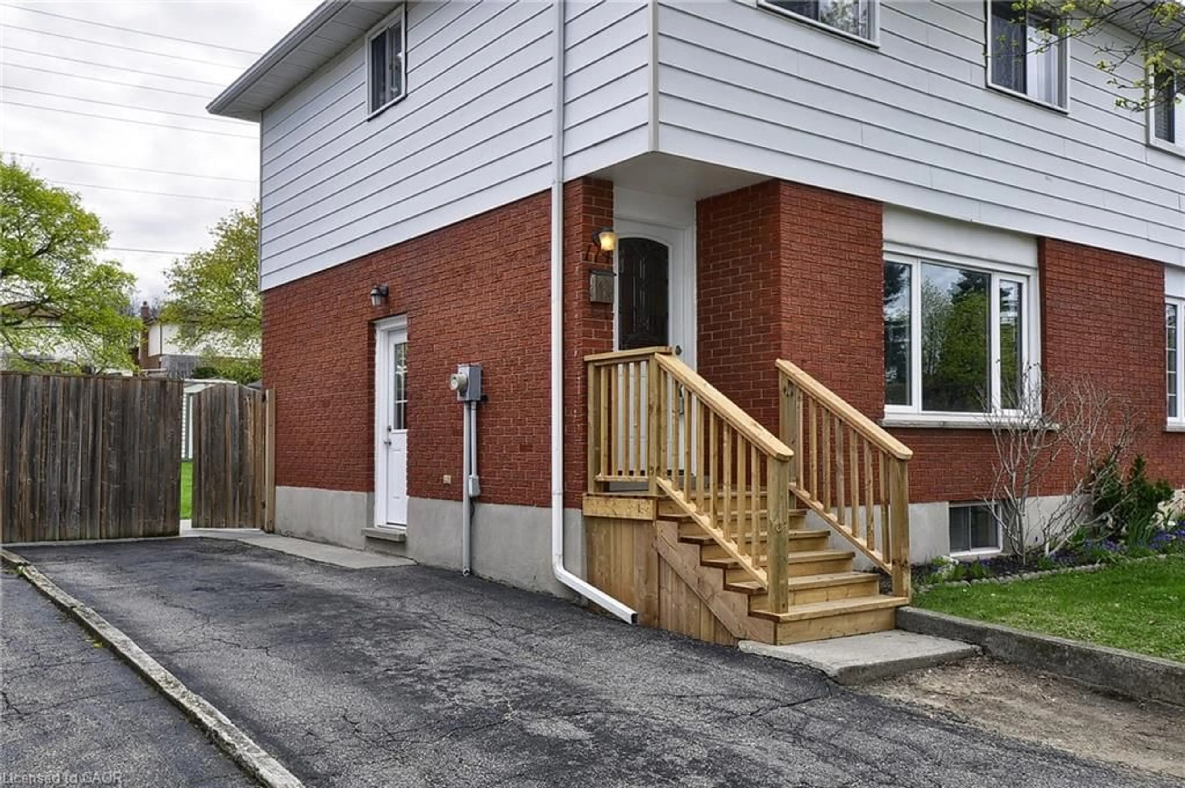 Home with brick exterior material, street for 114 Bakersfield Dr, Cambridge Ontario N1R 6X6