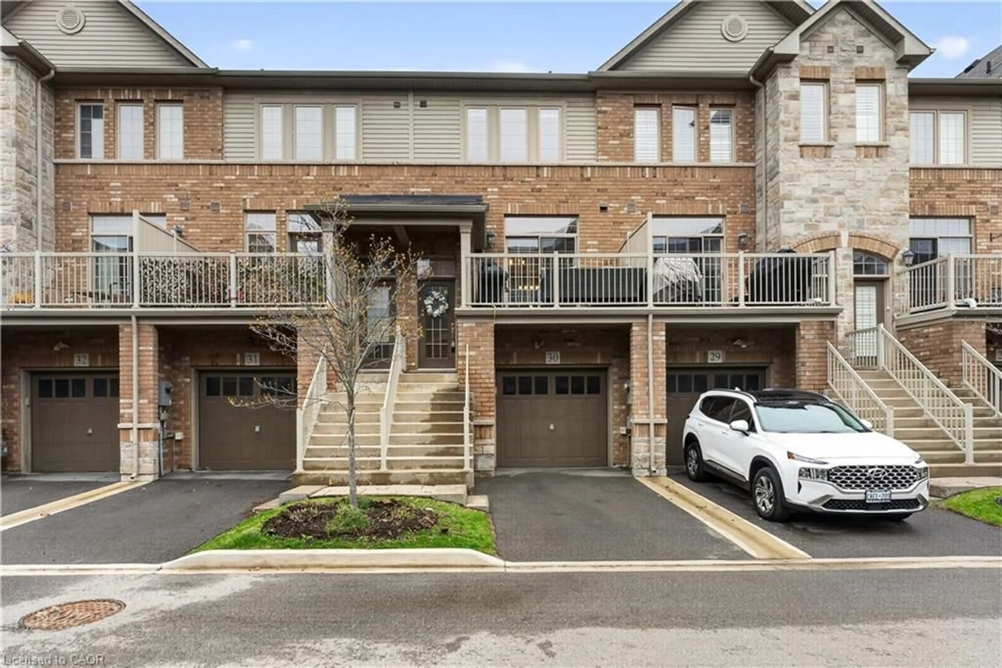 Home with brick exterior material, street for 4165 Upper Middle Rd #30, Burlington Ontario L7M 0V4