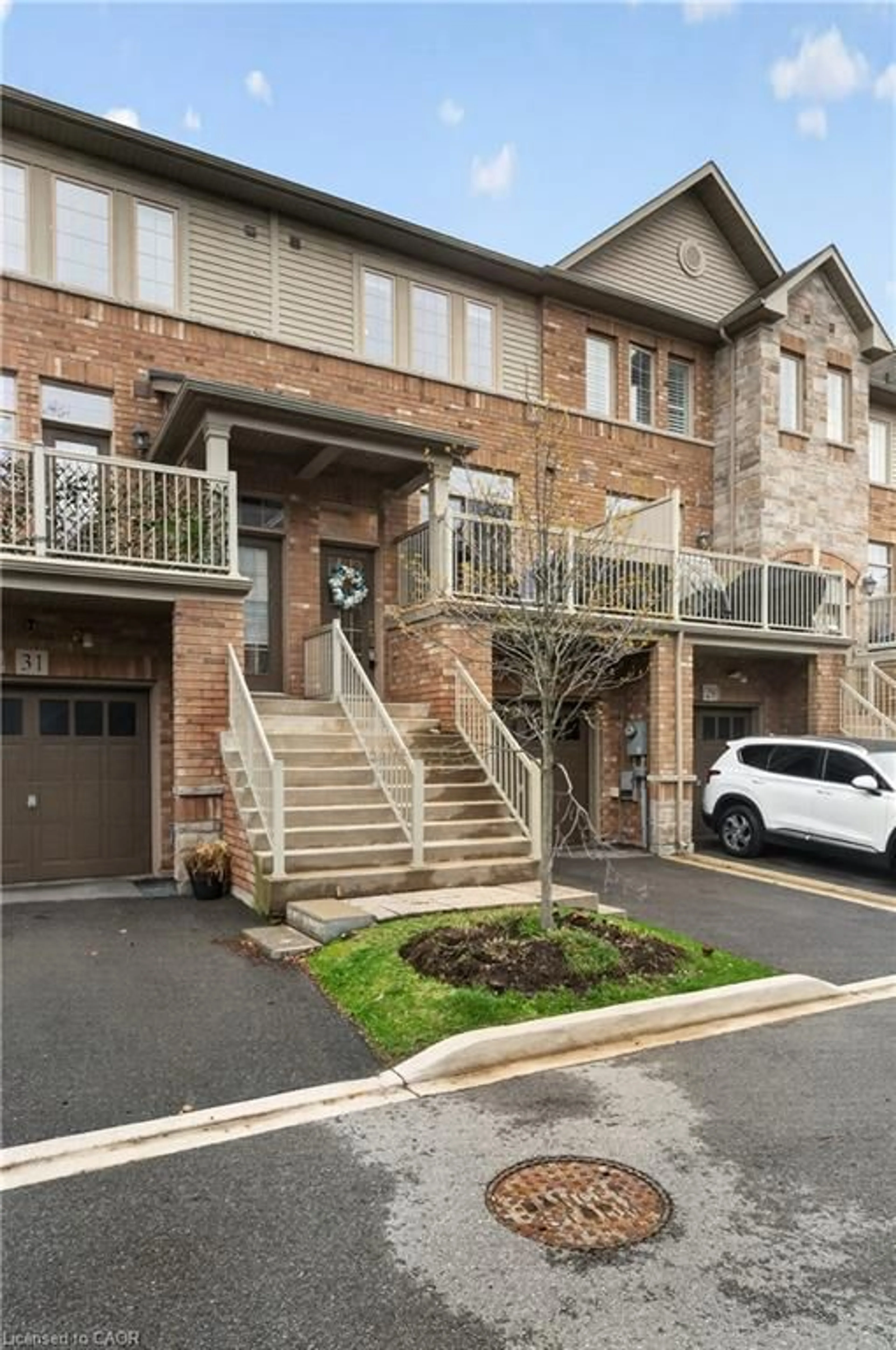 Home with brick exterior material, street for 4165 Upper Middle Rd #30, Burlington Ontario L7M 0V4