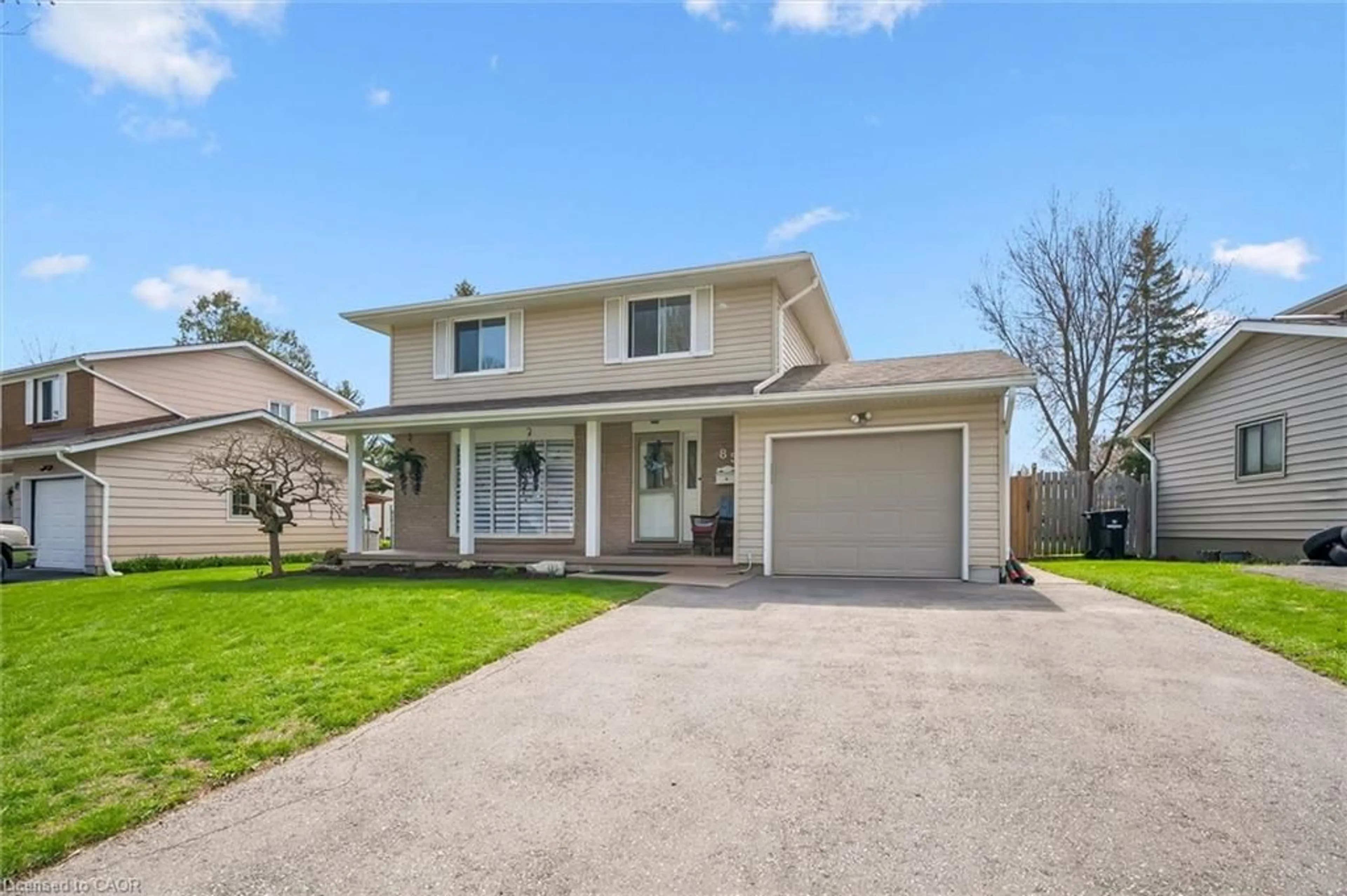 Home with vinyl exterior material, street for 85 Kingswood Dr, Kitchener Ontario N2E 1A9