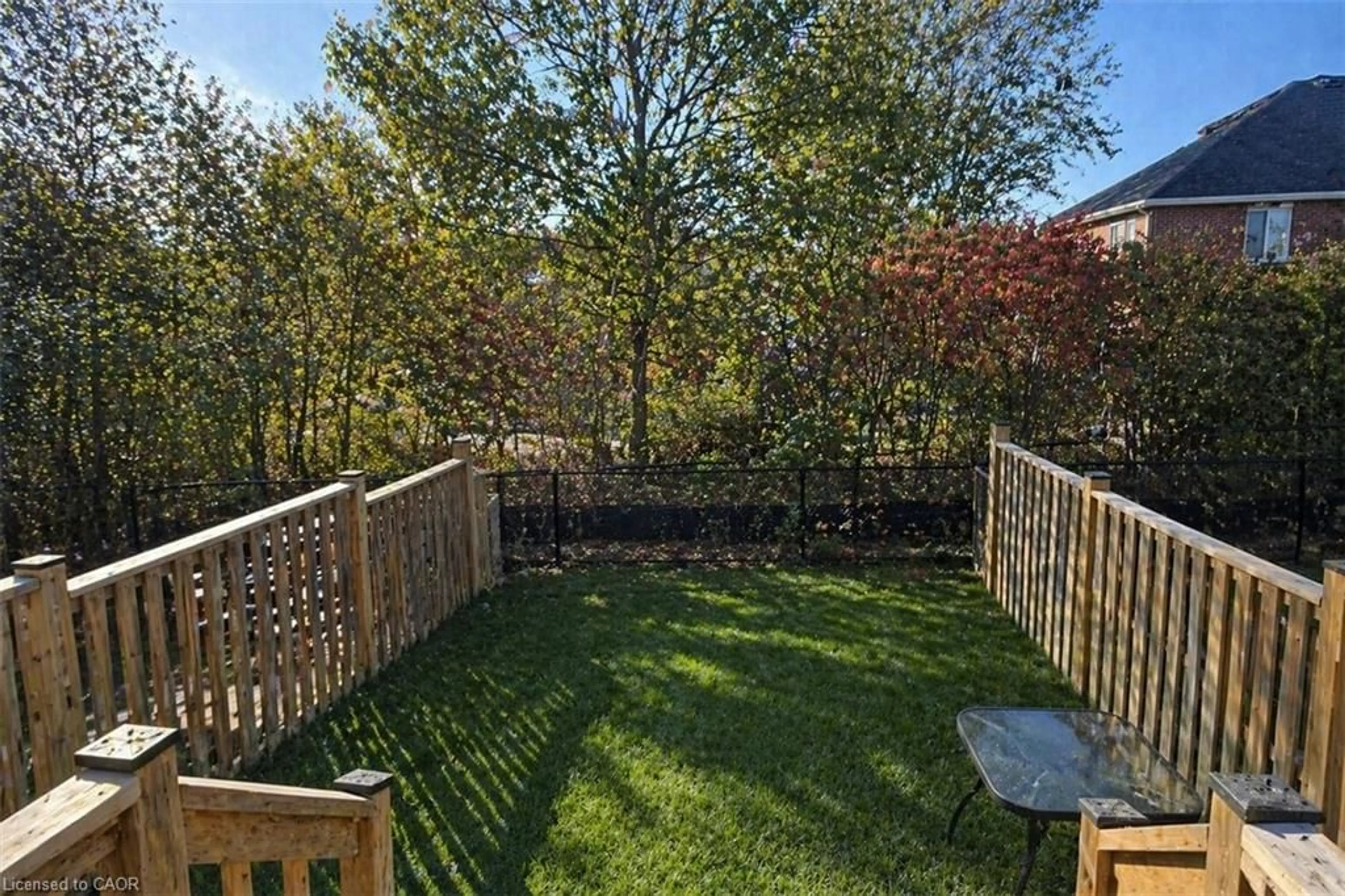 A pic from outside/outdoor area/front of a property/back of a property/a pic from drone, forest/trees view for 65 Meadowridge St, Kitchener Ontario N2P 0E2