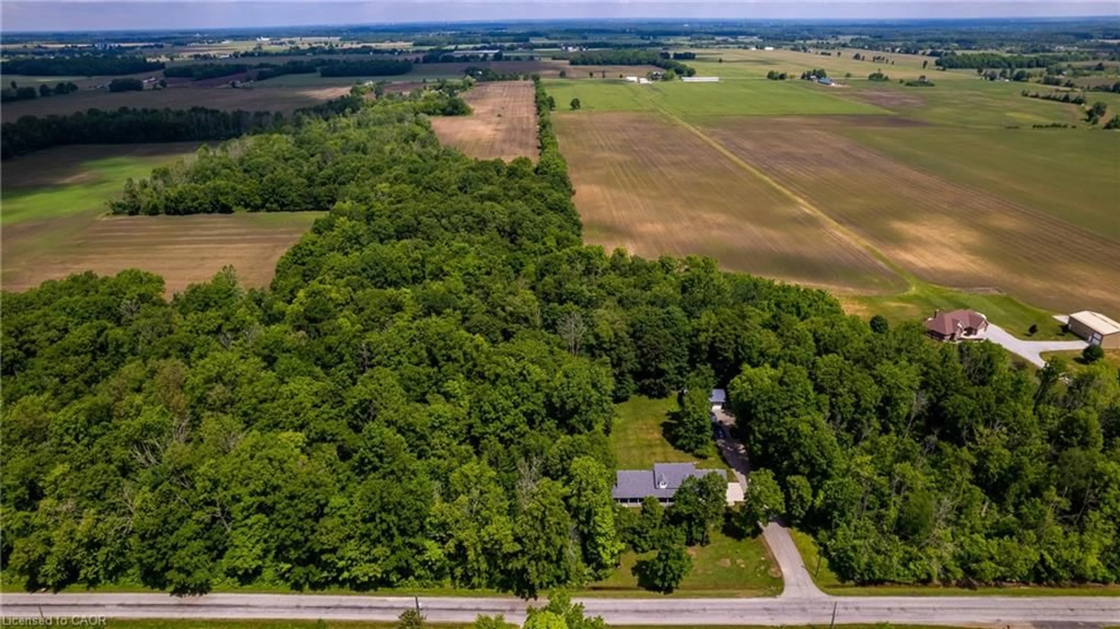 A pic from outside/outdoor area/front of a property/back of a property/a pic from drone, unknown for 1239 Conc 6 Townsend Rd, Waterford Ontario N0E 1Y0