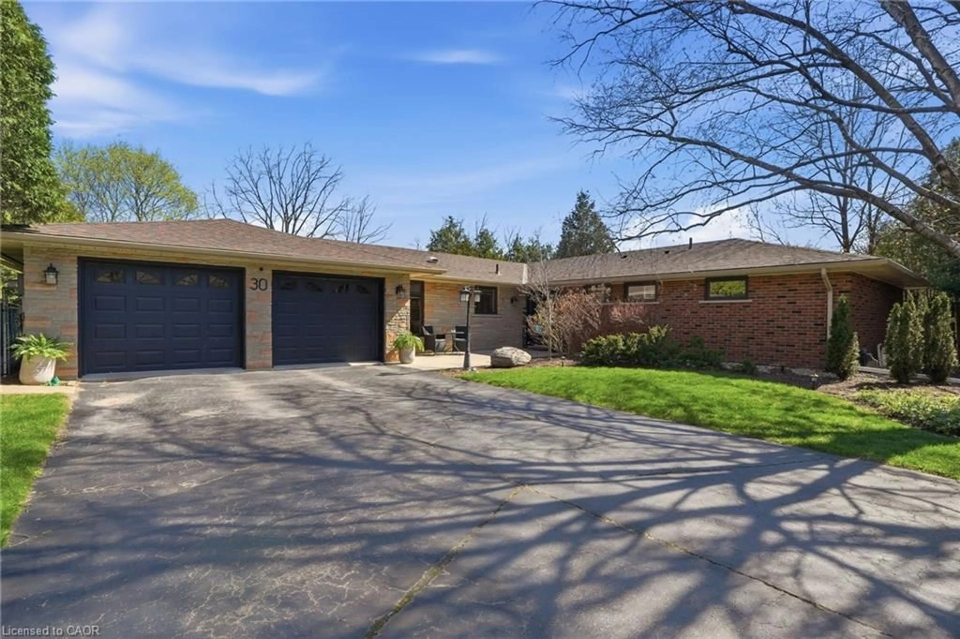 Home with brick exterior material, street for 30 Carl Cres, Waterdown Ontario L8B 0G5