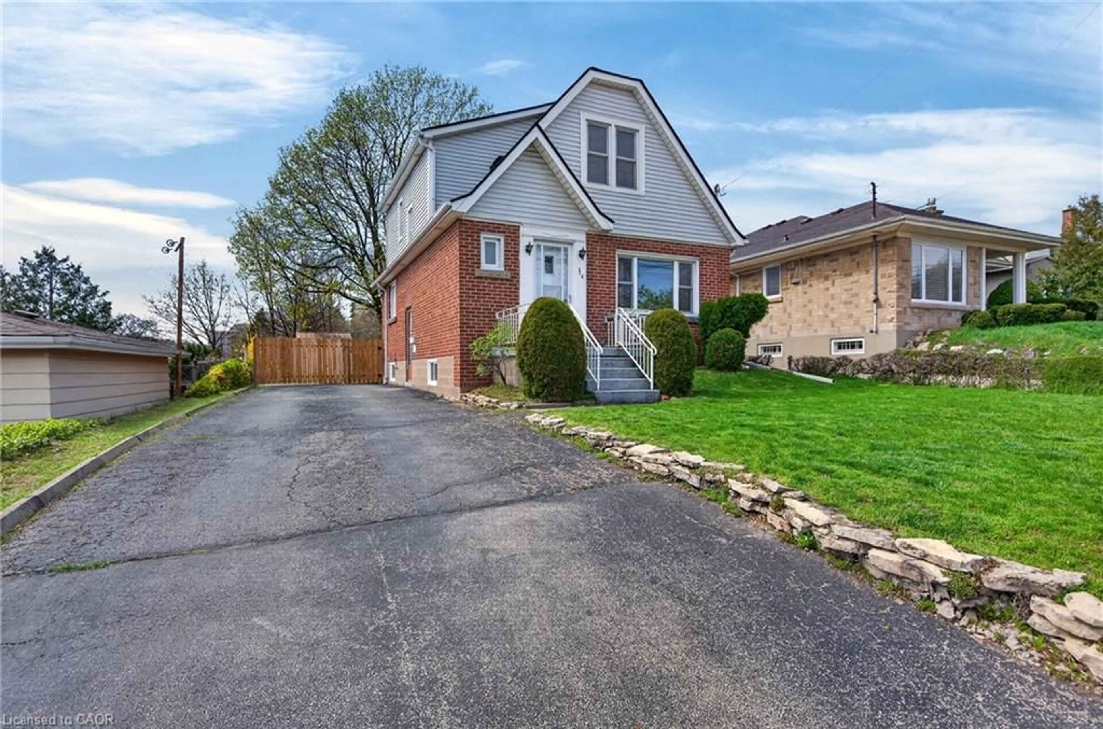 Home with brick exterior material, street for 276 Glenholme Ave, Hamilton Ontario L8K 3M2