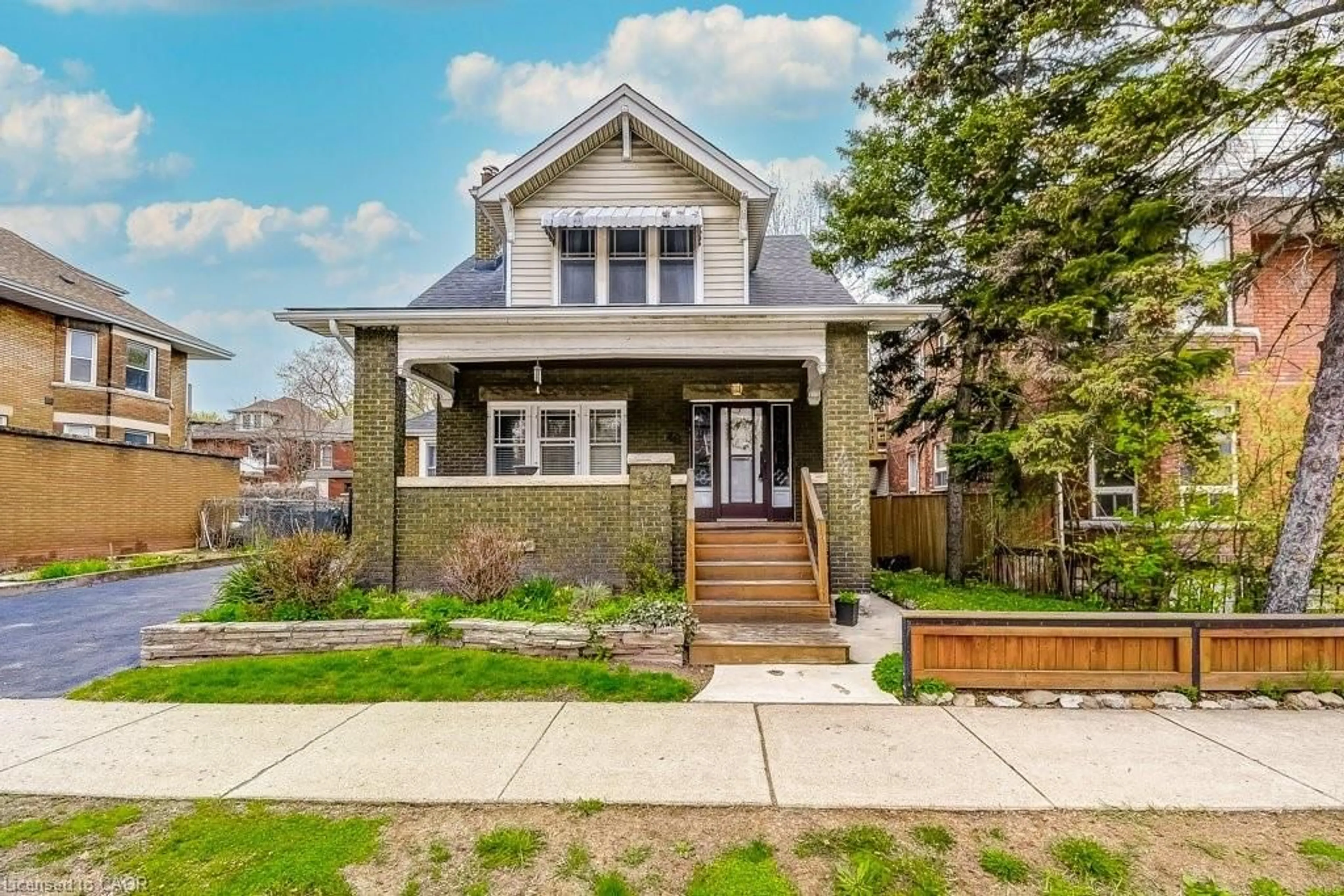 Home with brick exterior material, street for 46 Sherman Ave, Hamilton Ontario L8M 2P4