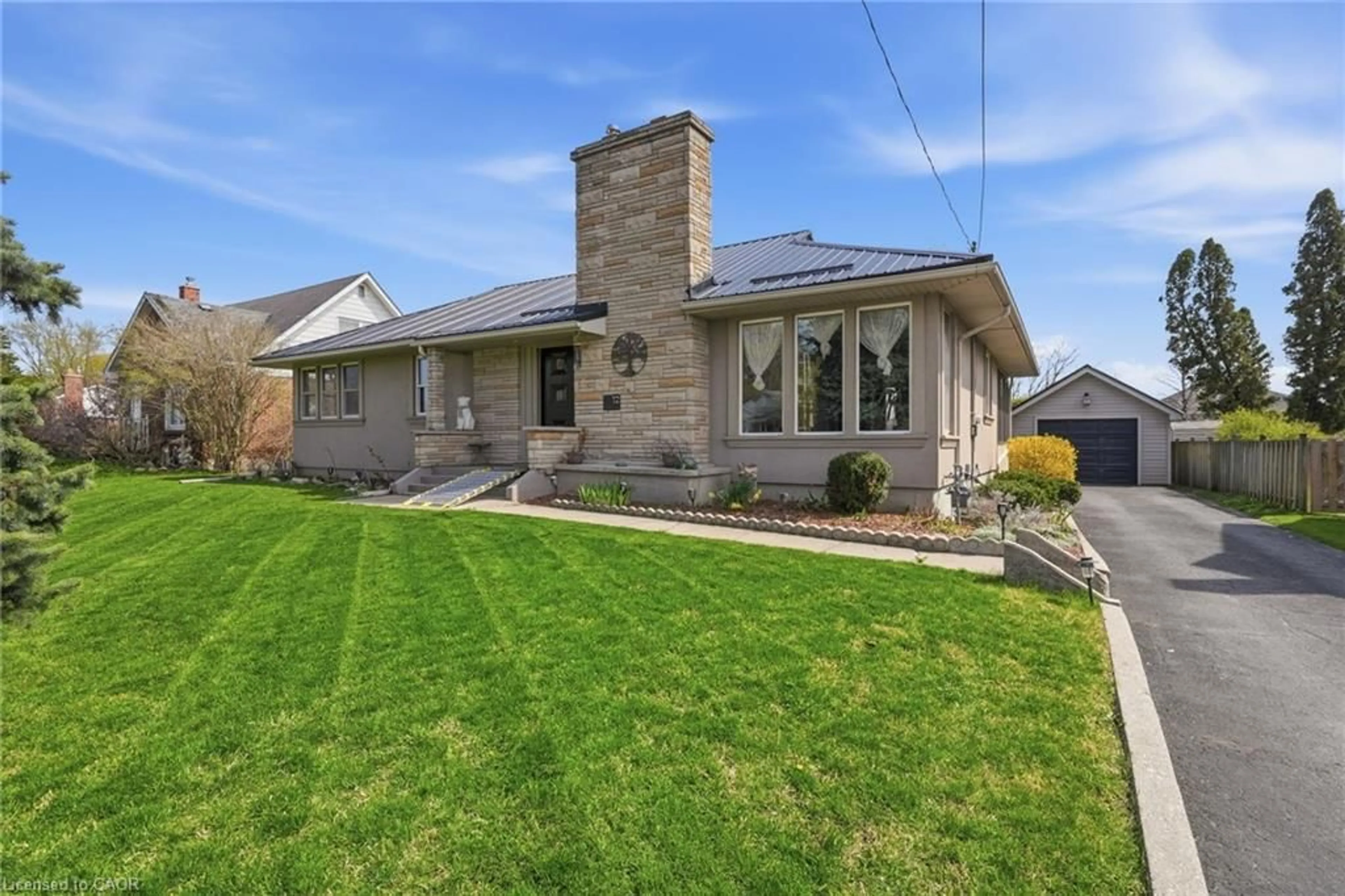 Home with brick exterior material, street for 12 Parkview Rd, Hagersville Ontario N0A 1H0