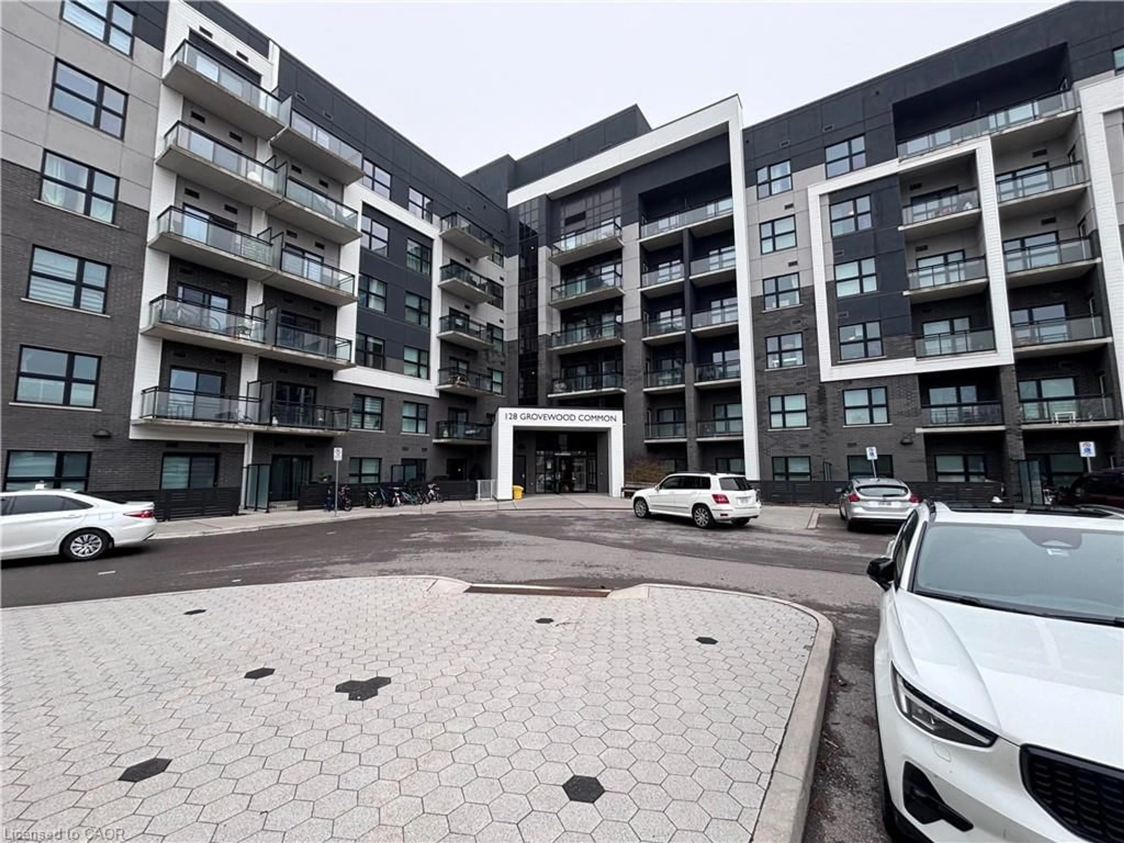 A pic from outside/outdoor area/front of a property/back of a property/a pic from drone, street for 128 Grovewood Common #417, Oakville Ontario L6H 0X3