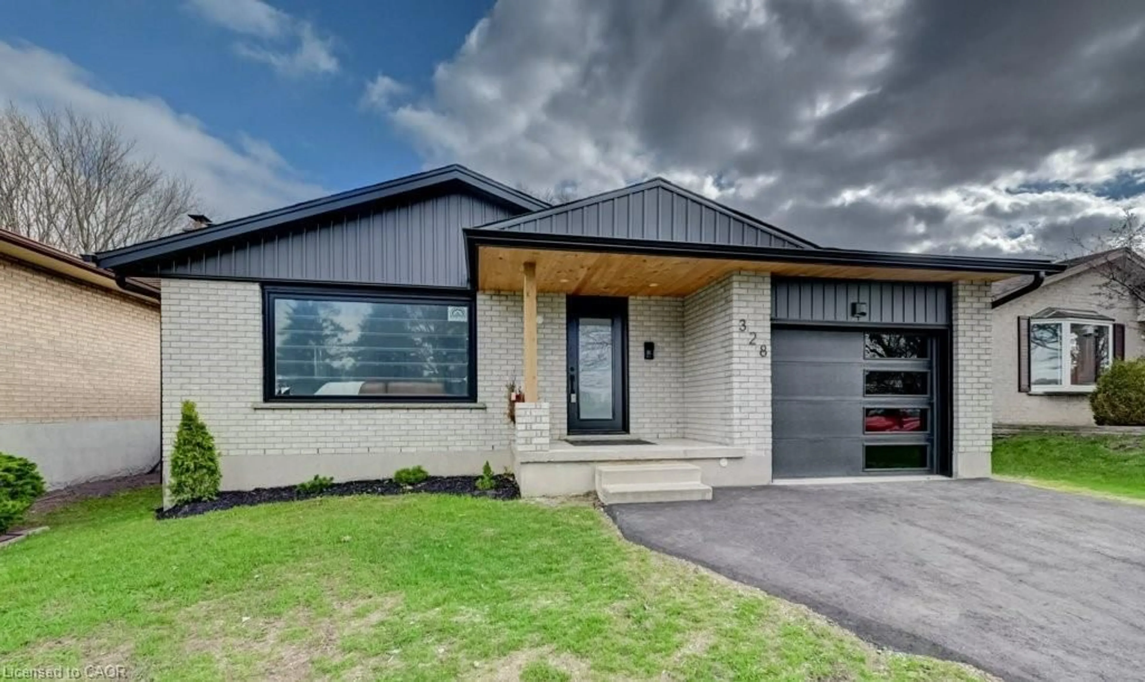 Home with brick exterior material, street for 328 The Country Way, Kitchener Ontario N2E 2T3