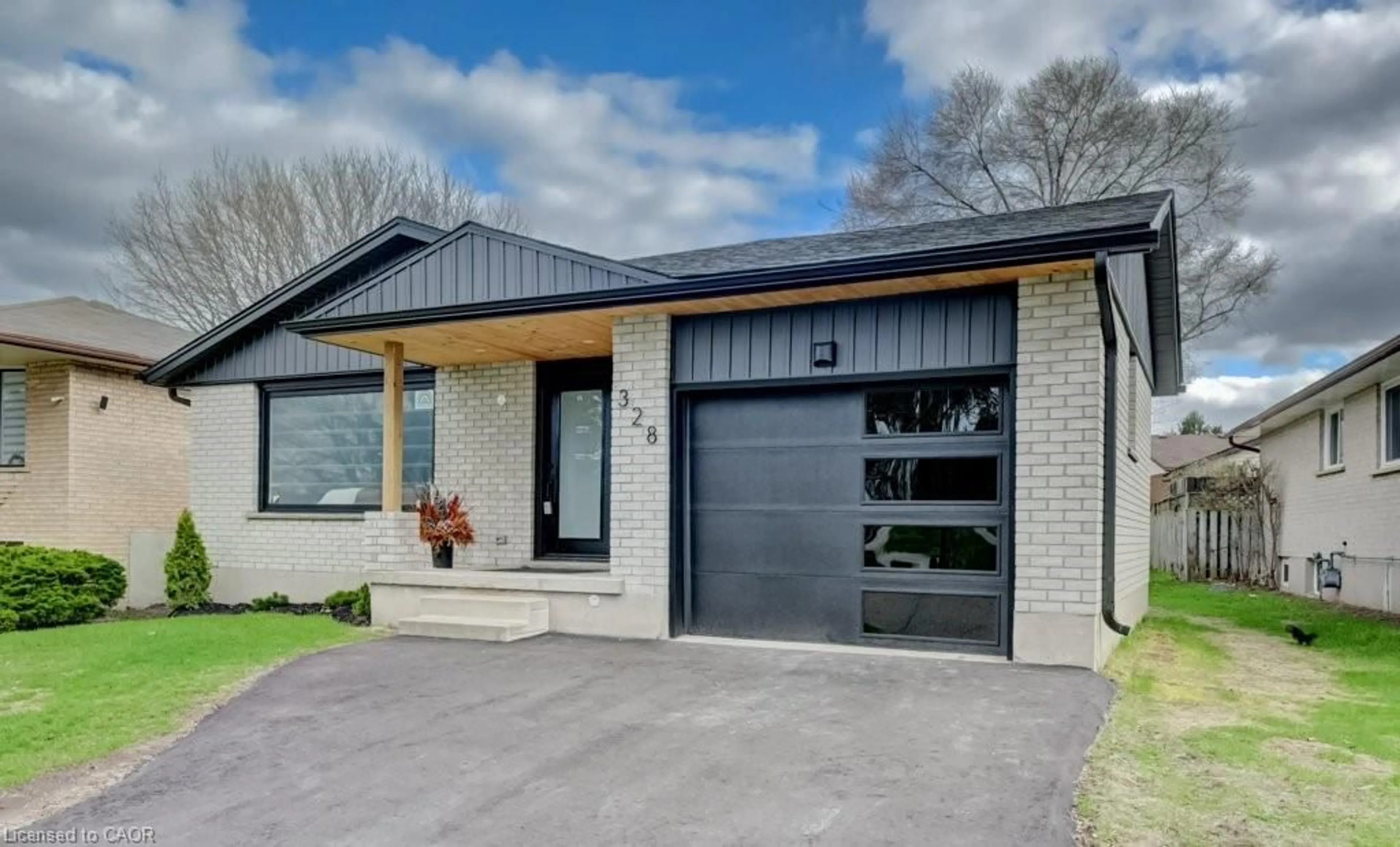 Home with brick exterior material, street for 328 The Country Way, Kitchener Ontario N2E 2T3