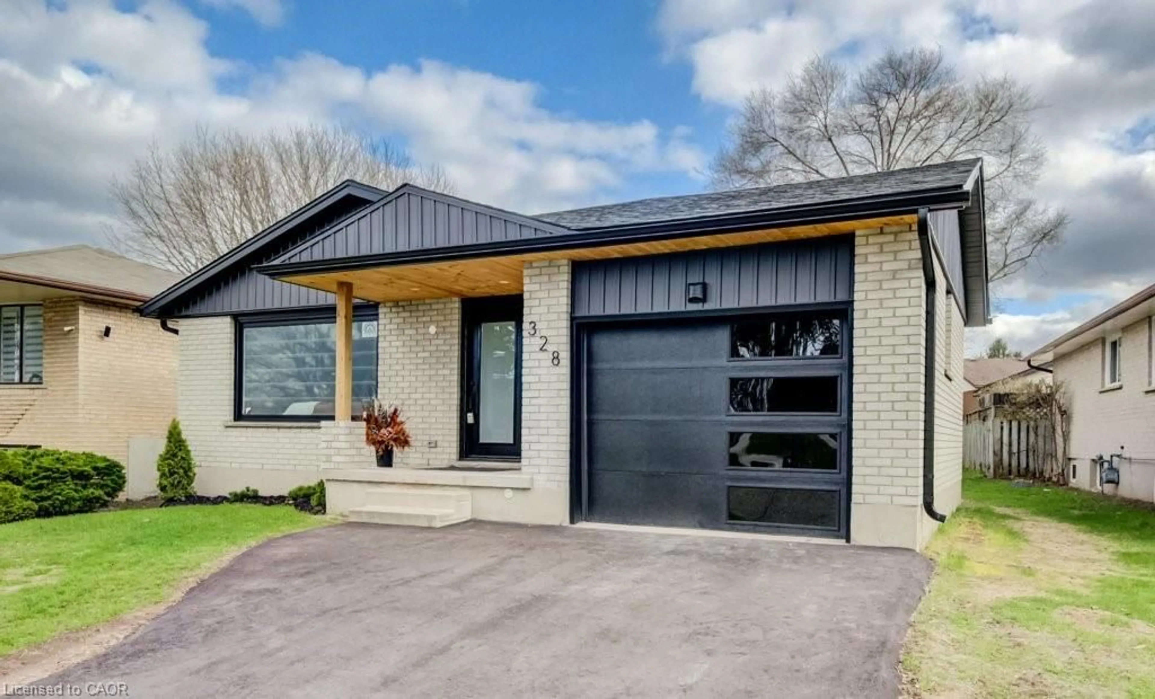 Home with brick exterior material, street for 328 The Country Way, Kitchener Ontario N2E 2T3