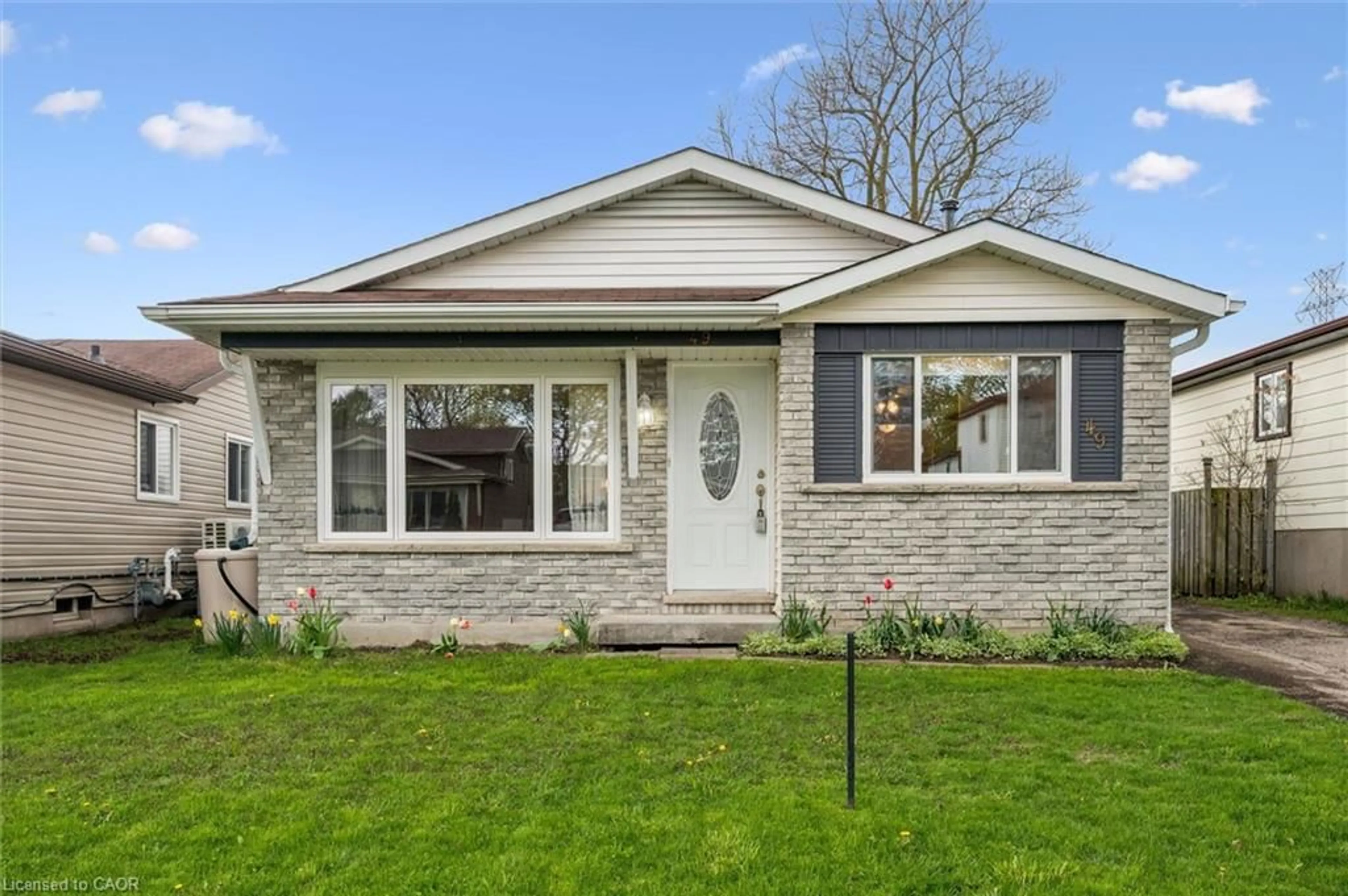 Home with brick exterior material, street for 49 Broken Oak Cres, Kitchener Ontario N2N 1N8