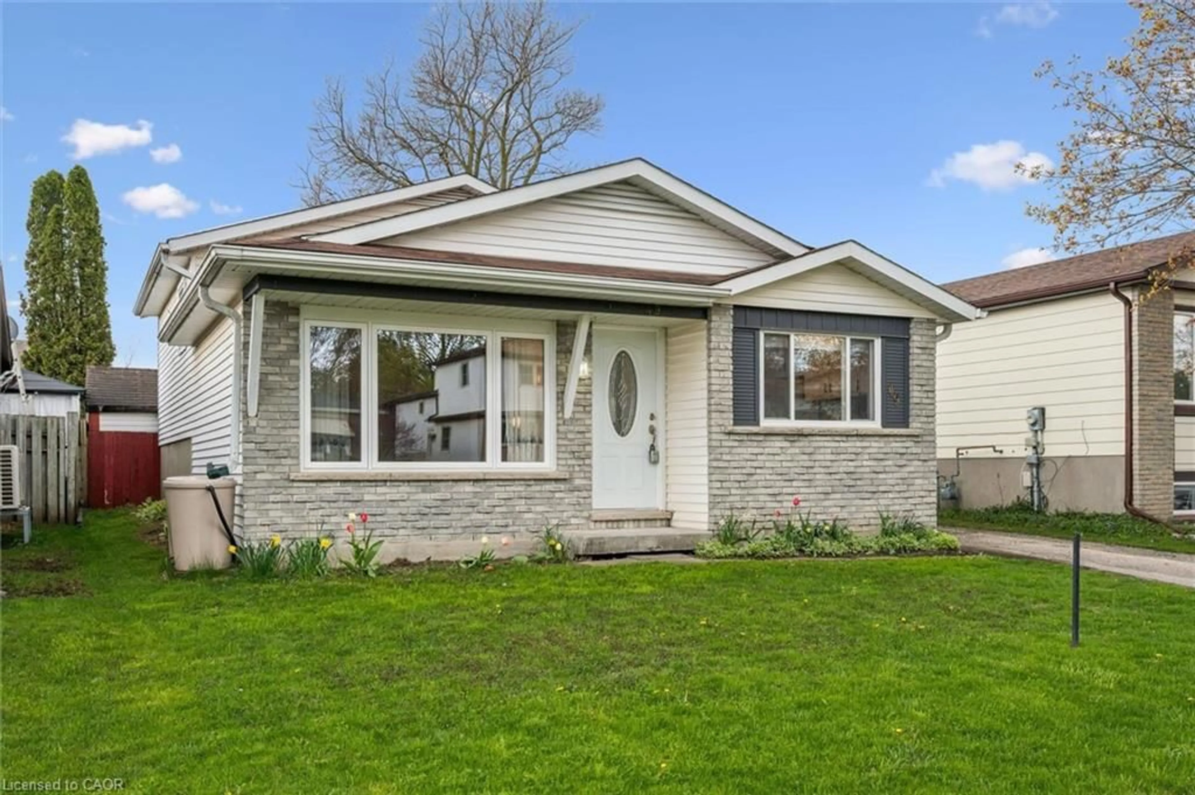 Home with vinyl exterior material, street for 49 Broken Oak Cres, Kitchener Ontario N2N 1N8