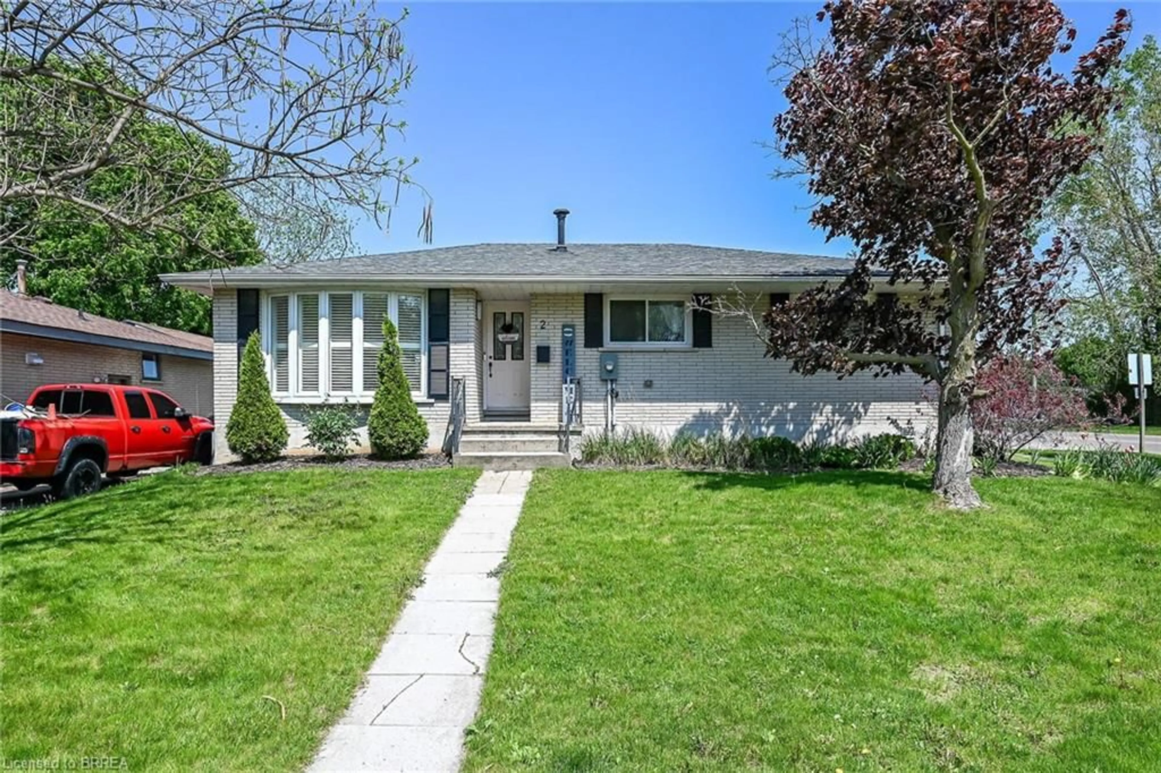 Home with vinyl exterior material, street for 2 Coachwood Rd, Brantford Ontario N3R 3R4