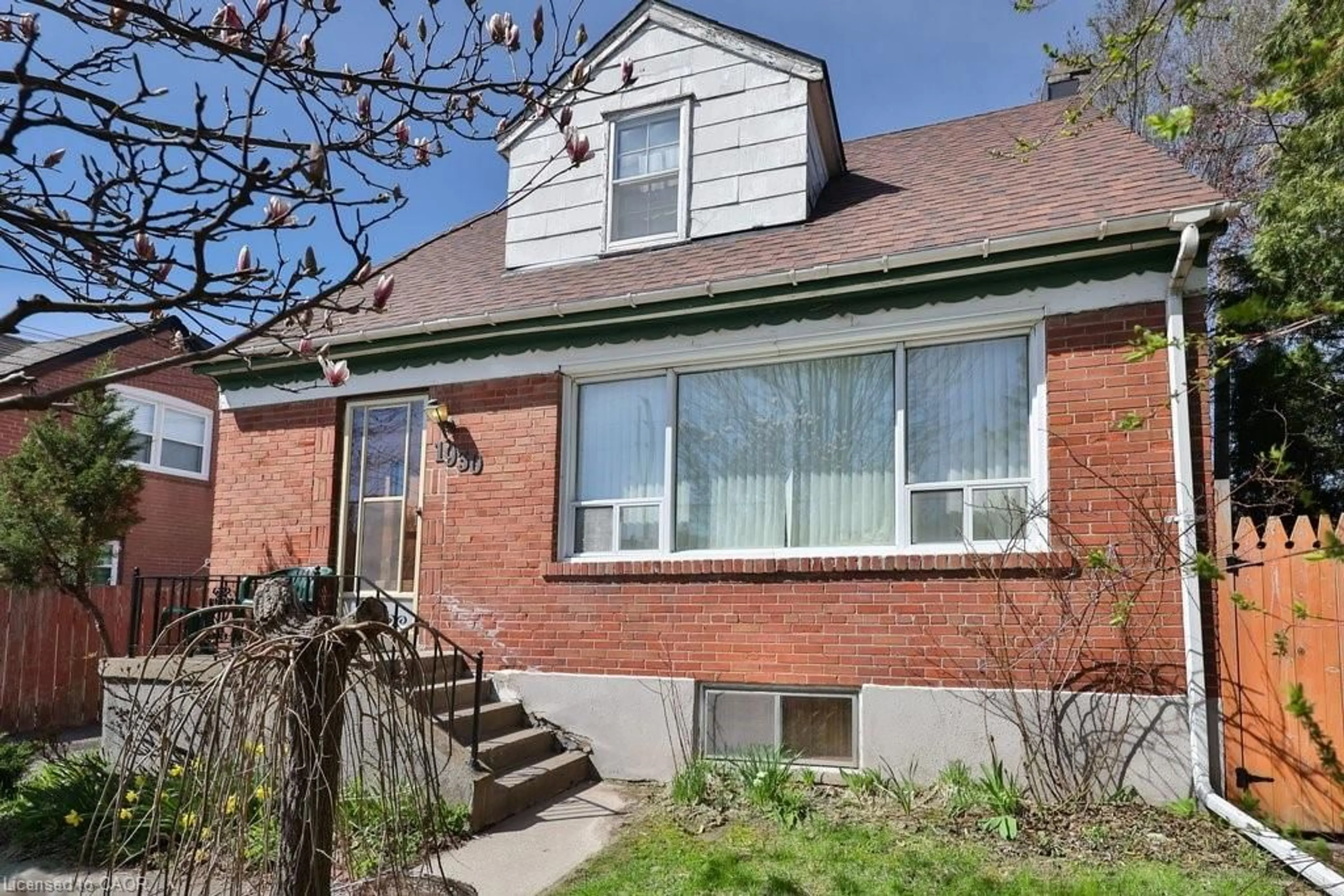 Home with brick exterior material, street for 1930 Keele St, York Ontario M6M 3X8