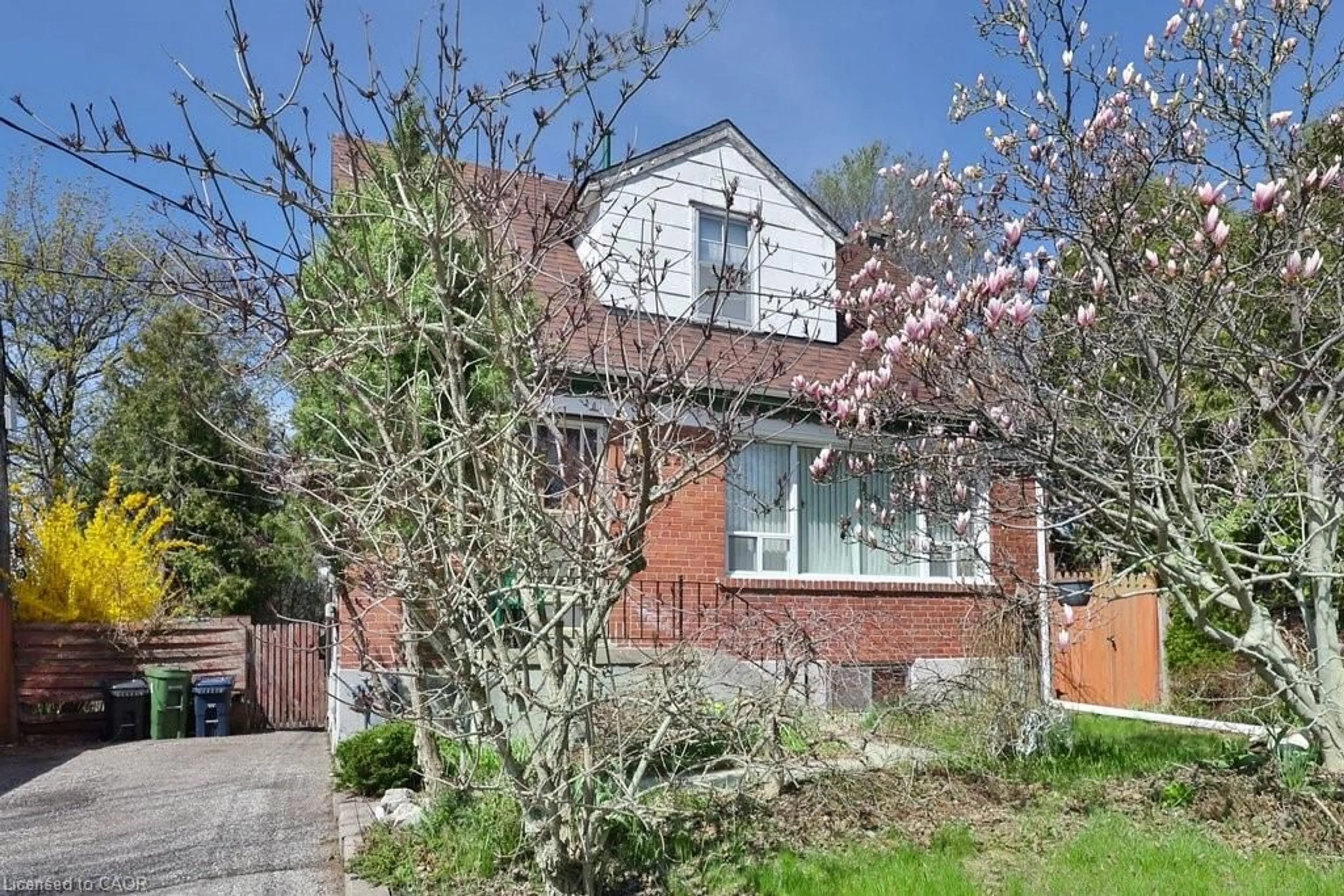 Home with brick exterior material, street for 1930 Keele St, York Ontario M6M 3X8