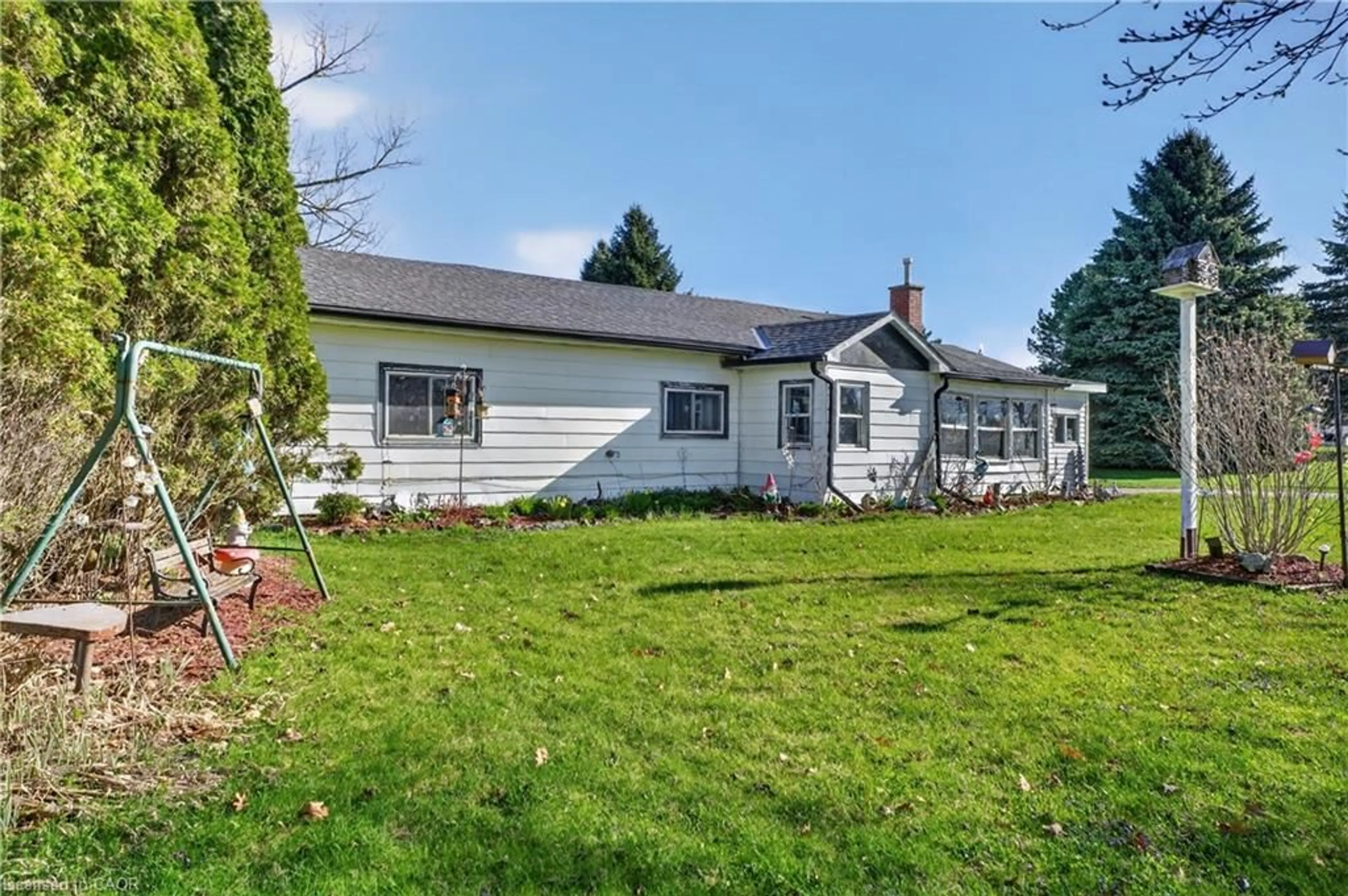 A pic from outside/outdoor area/front of a property/back of a property/a pic from drone, unknown for 645 Queen St, Mount Forest Ontario N0G 2L1