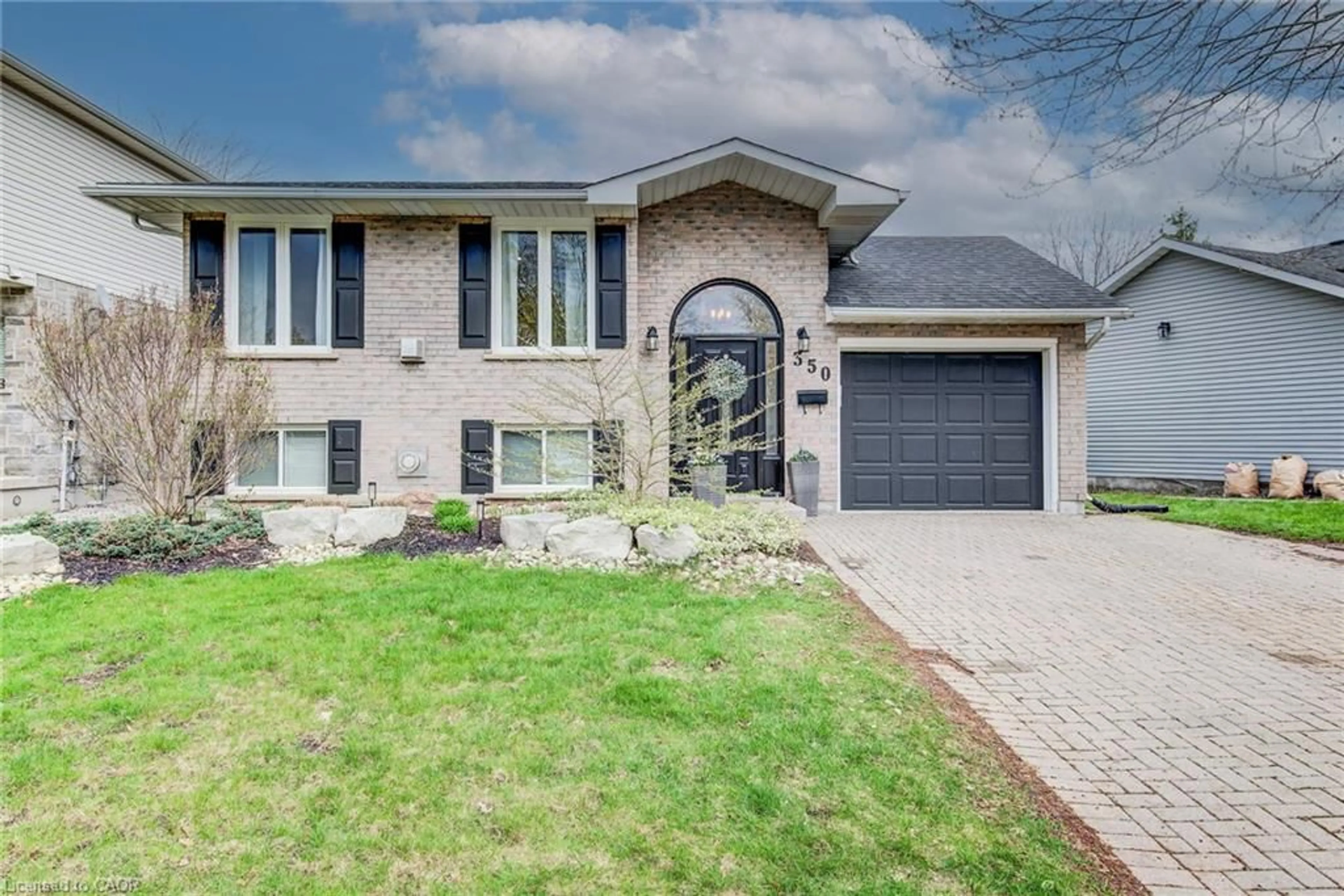 Home with brick exterior material, street for 350 Auburn Dr, Waterloo Ontario N2K 3K9