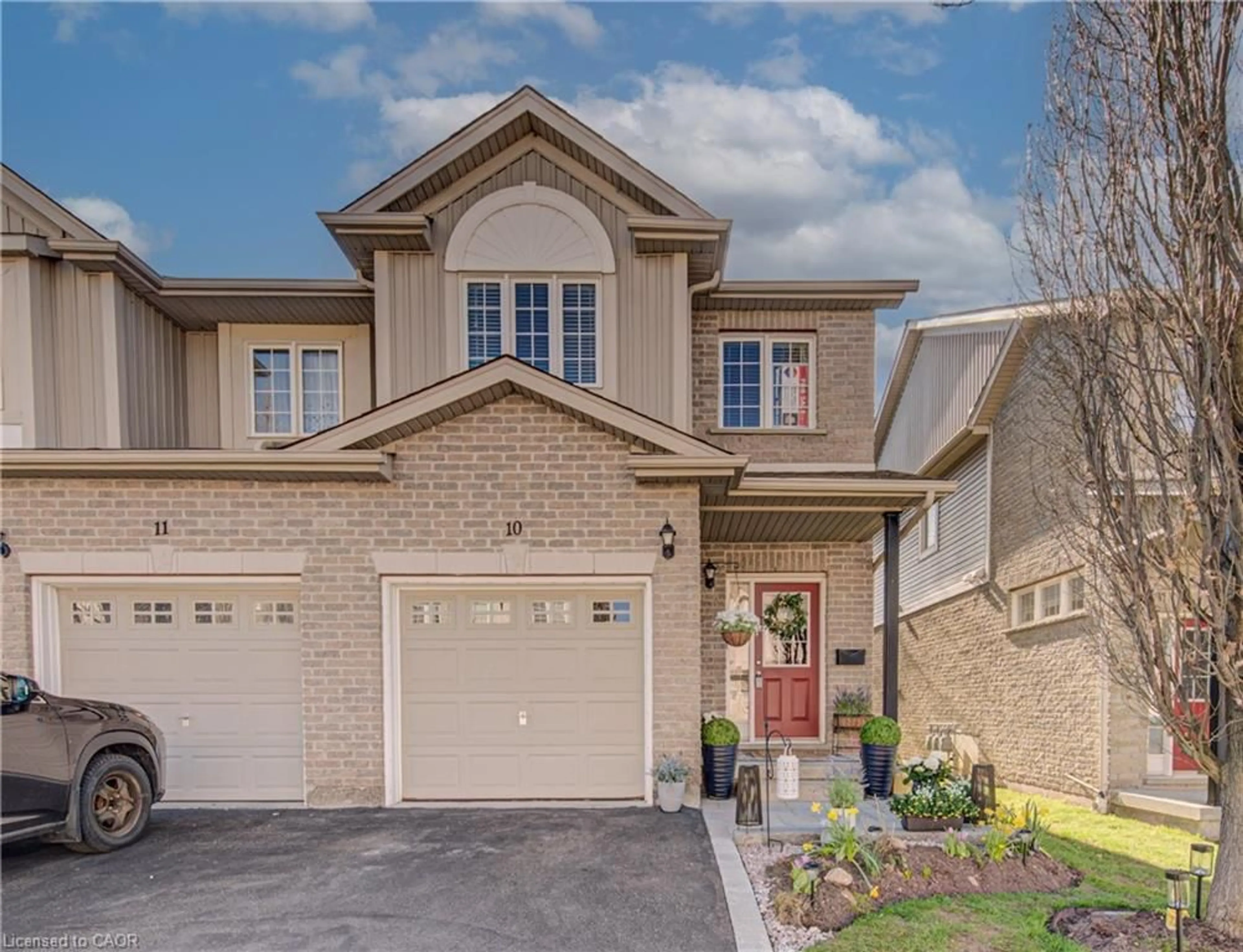 Home with brick exterior material, street for 105 Pinnacle Dr #10, Kitchener Ontario N2P 1B8
