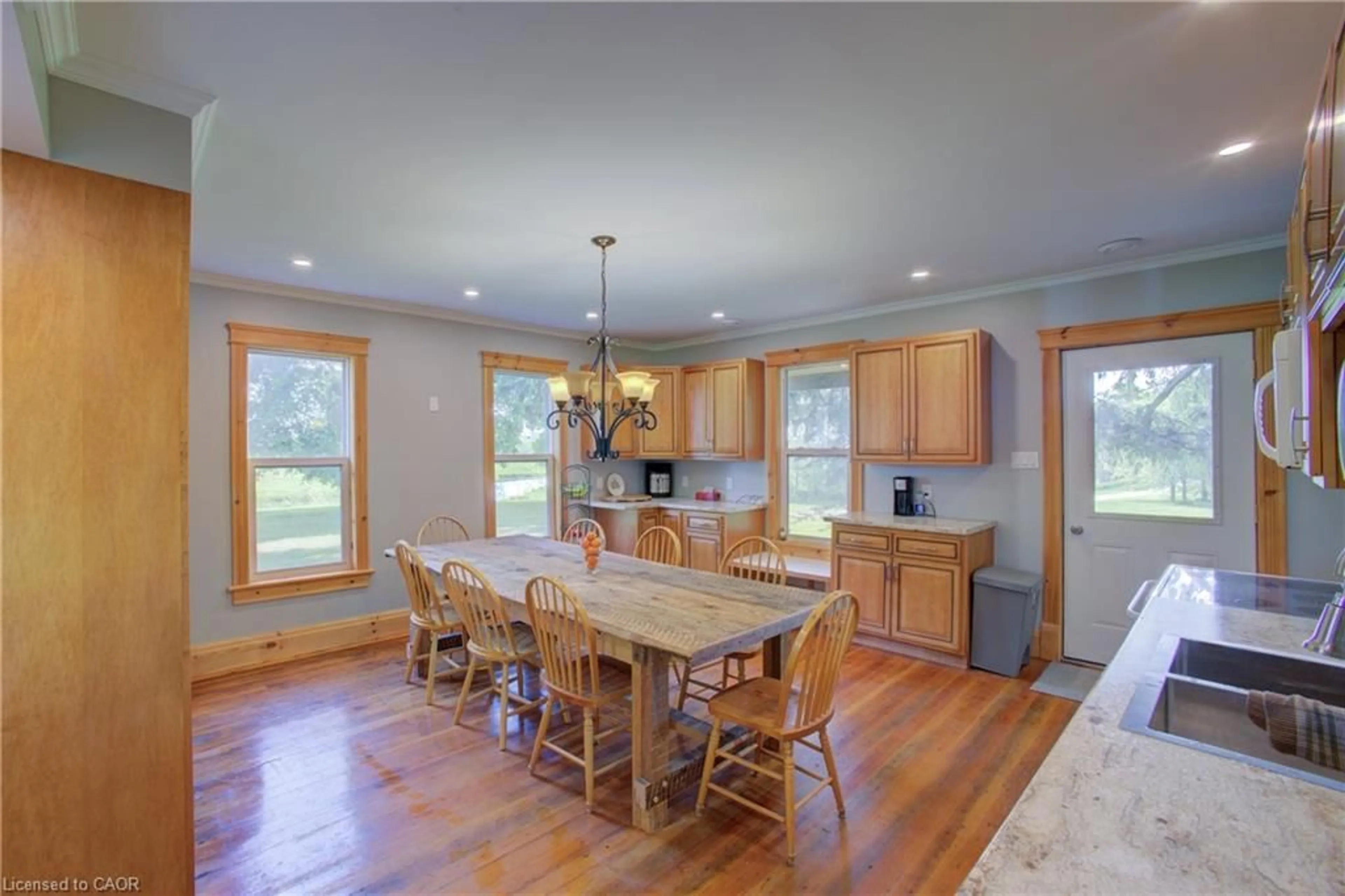 Open concept kitchen, wood/laminate floor for 86561 London Rd, North Huron (Twp) Ontario N0G 2W0
