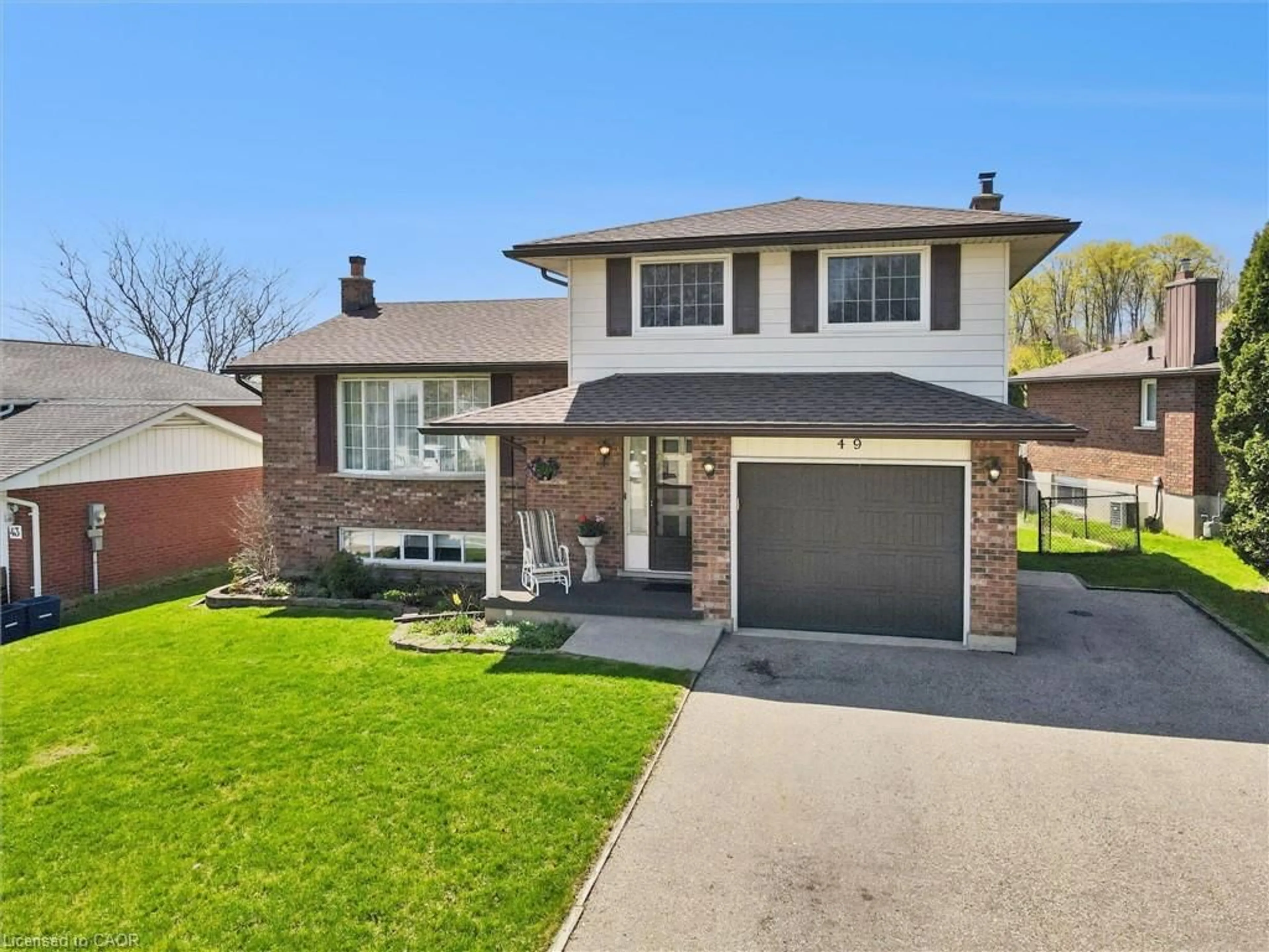 Home with brick exterior material, street for 49 Ripley Cres, Kitchener Ontario N2N 1W2