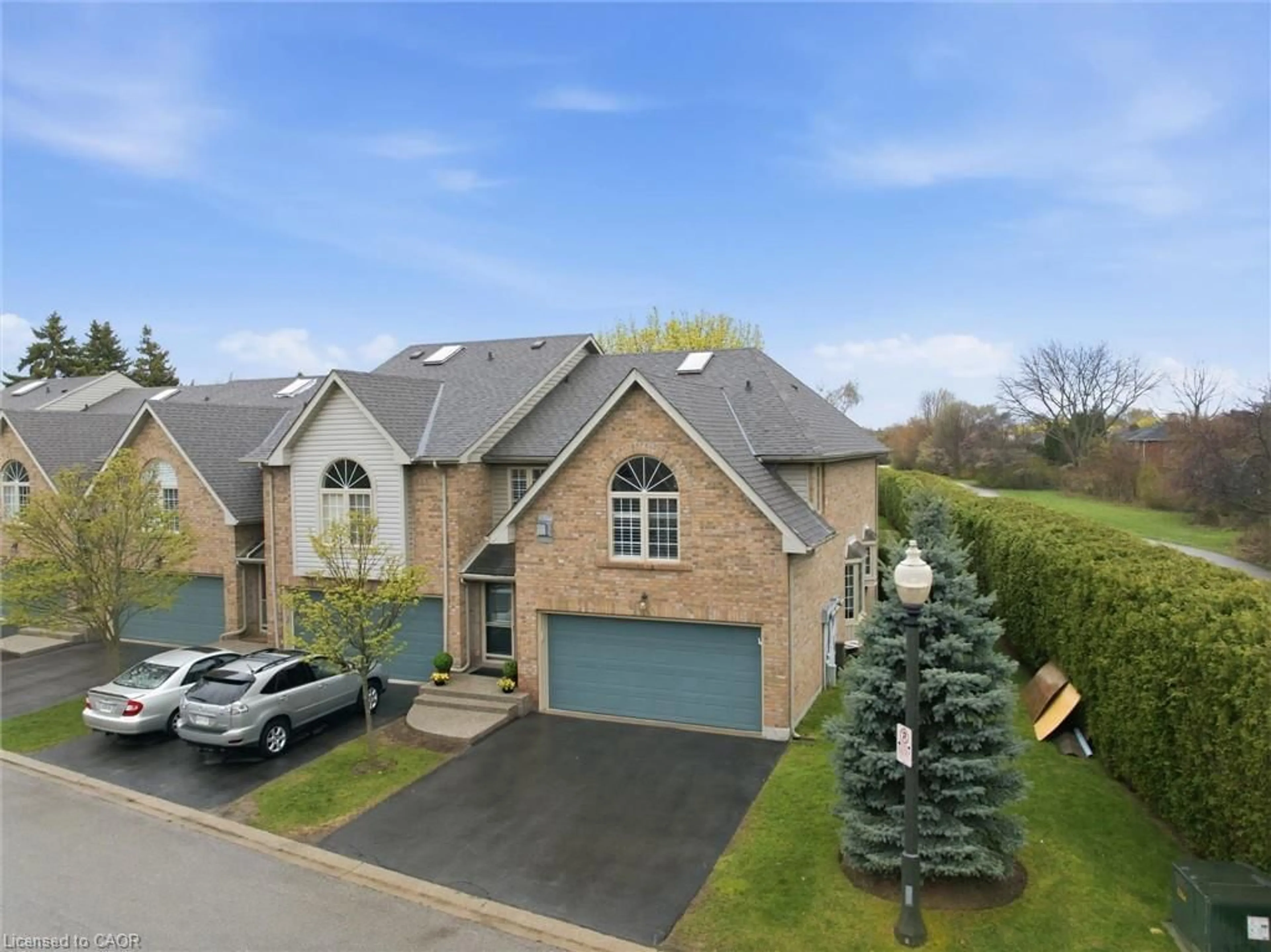 A pic from outside/outdoor area/front of a property/back of a property/a pic from drone, street for 3333 New St #44, Burlington Ontario L7N 1N1