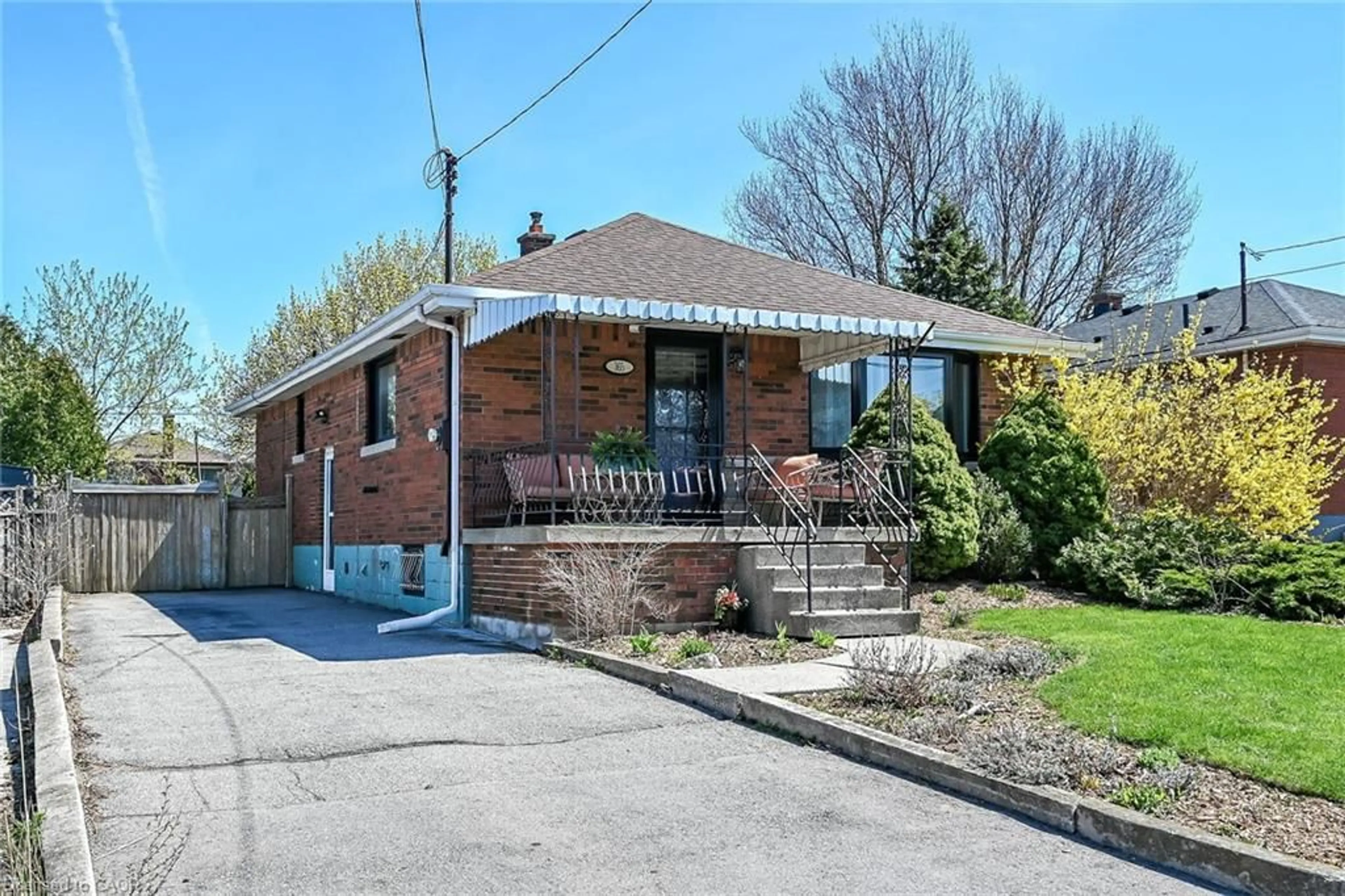 Home with brick exterior material, street for 365 East 18th St, Hamilton Ontario L9A 4P7