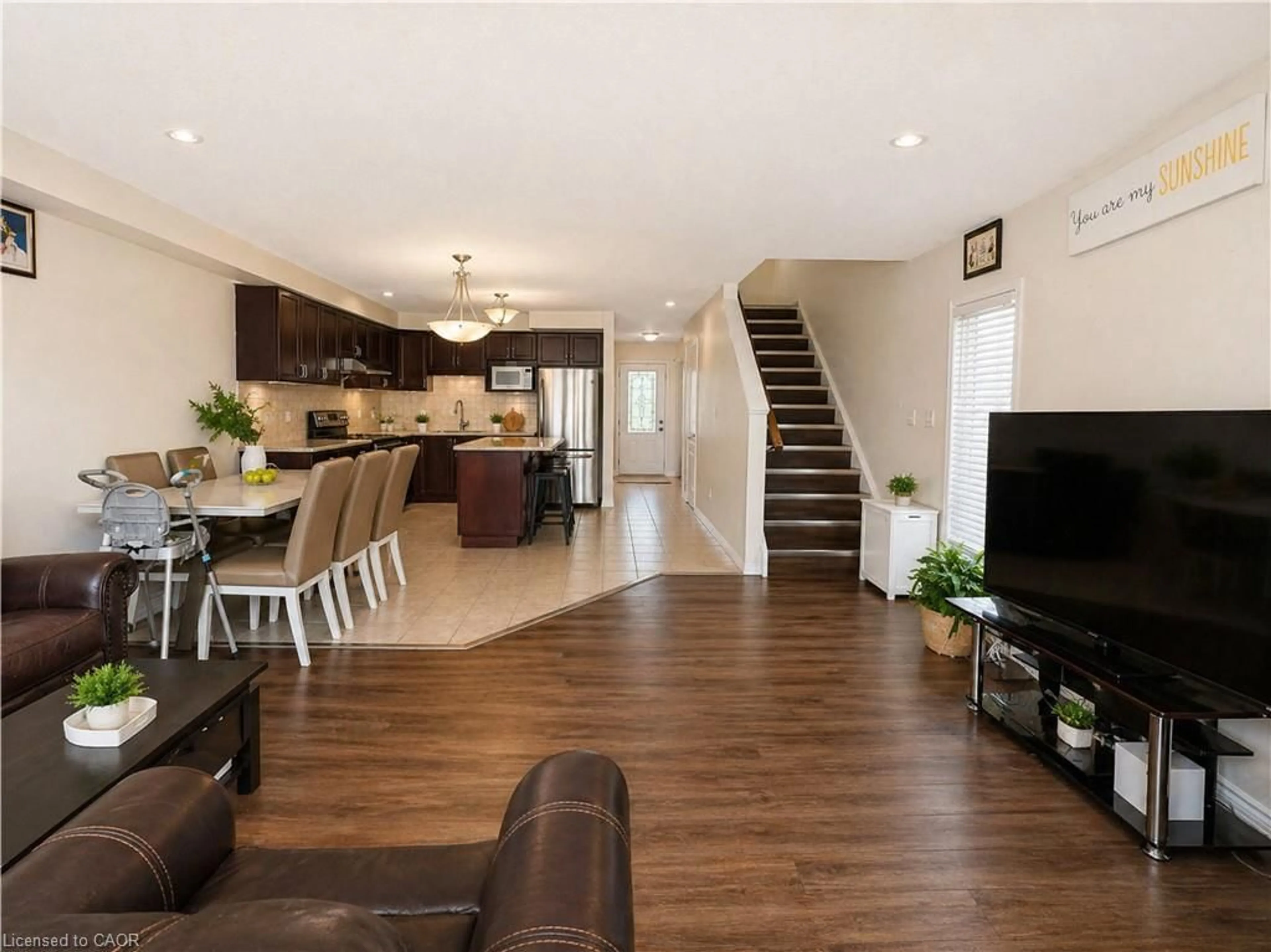 Open concept kitchen, wood/laminate floor for 1364 Countrystone Dr, Kitchener Ontario N2N 3R8