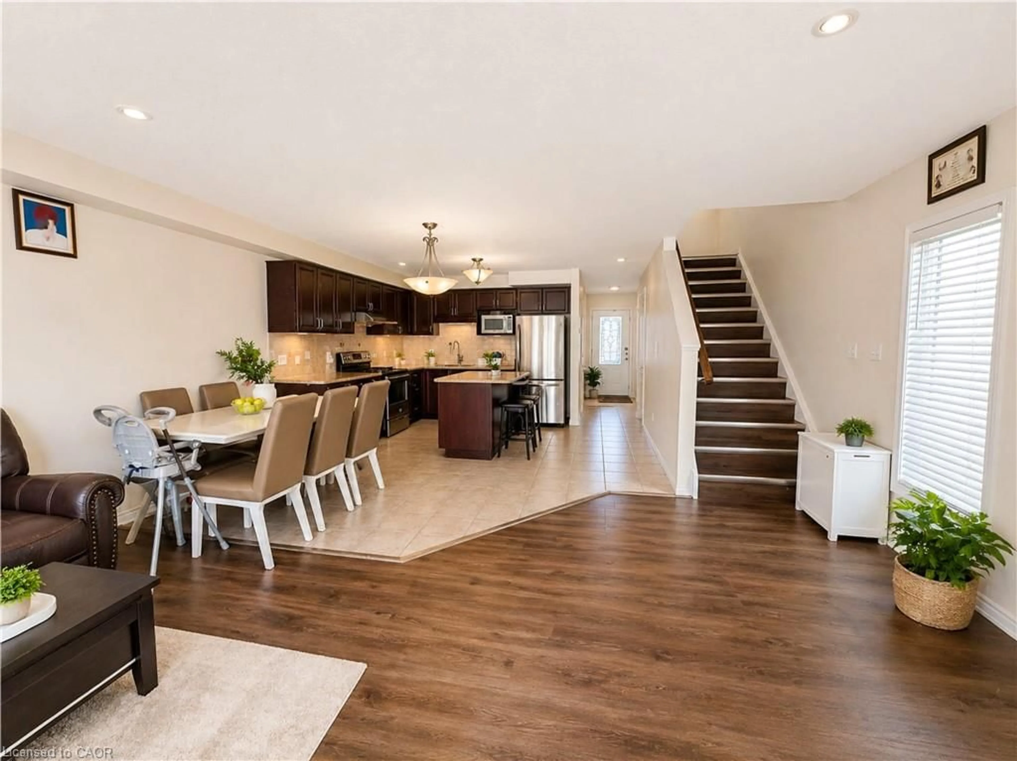 Open concept kitchen, wood/laminate floor for 1364 Countrystone Dr, Kitchener Ontario N2N 3R8