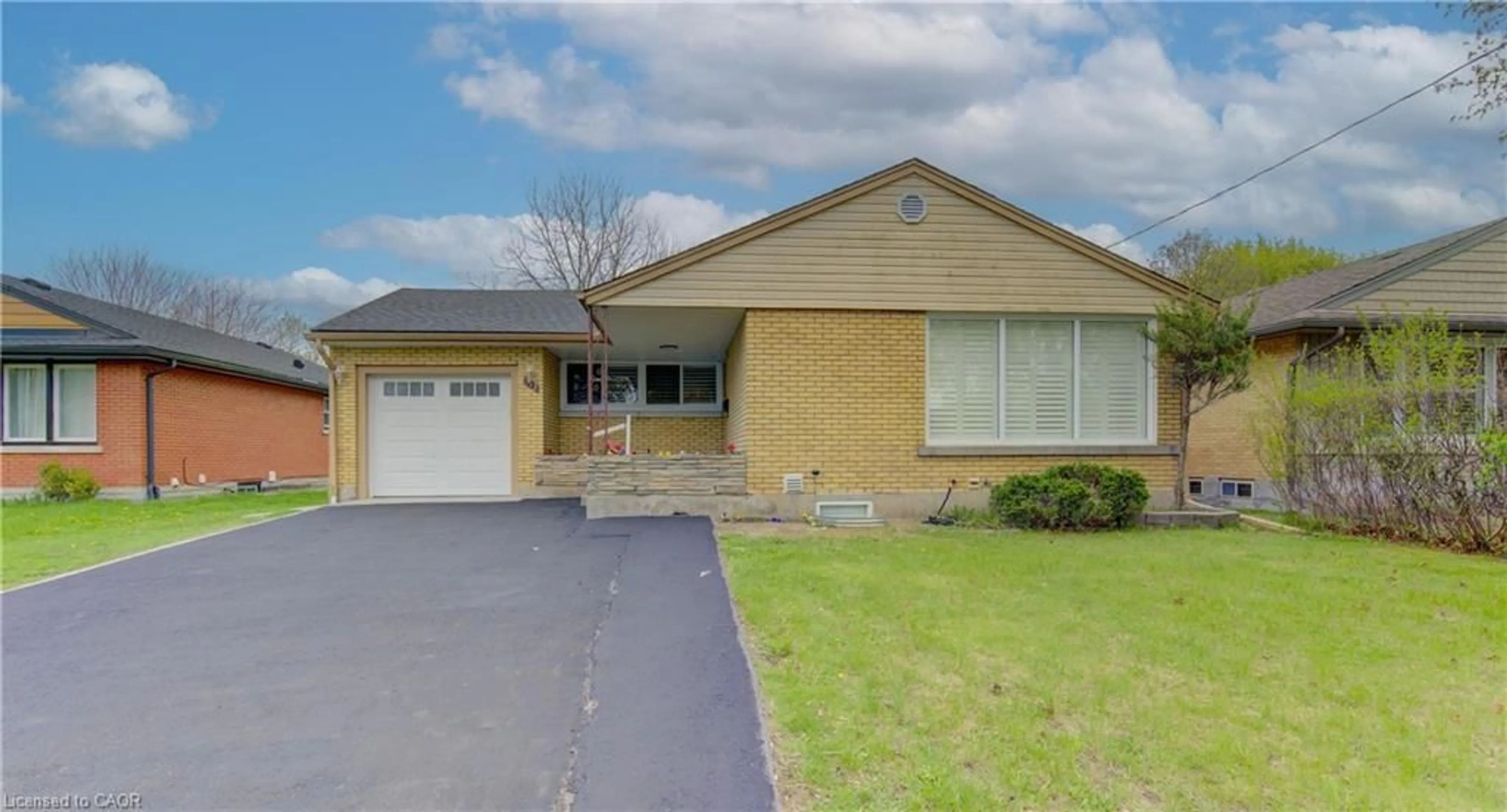 Home with brick exterior material, street for 153 Woodhaven Rd, Kitchener Ontario N2C 1V2