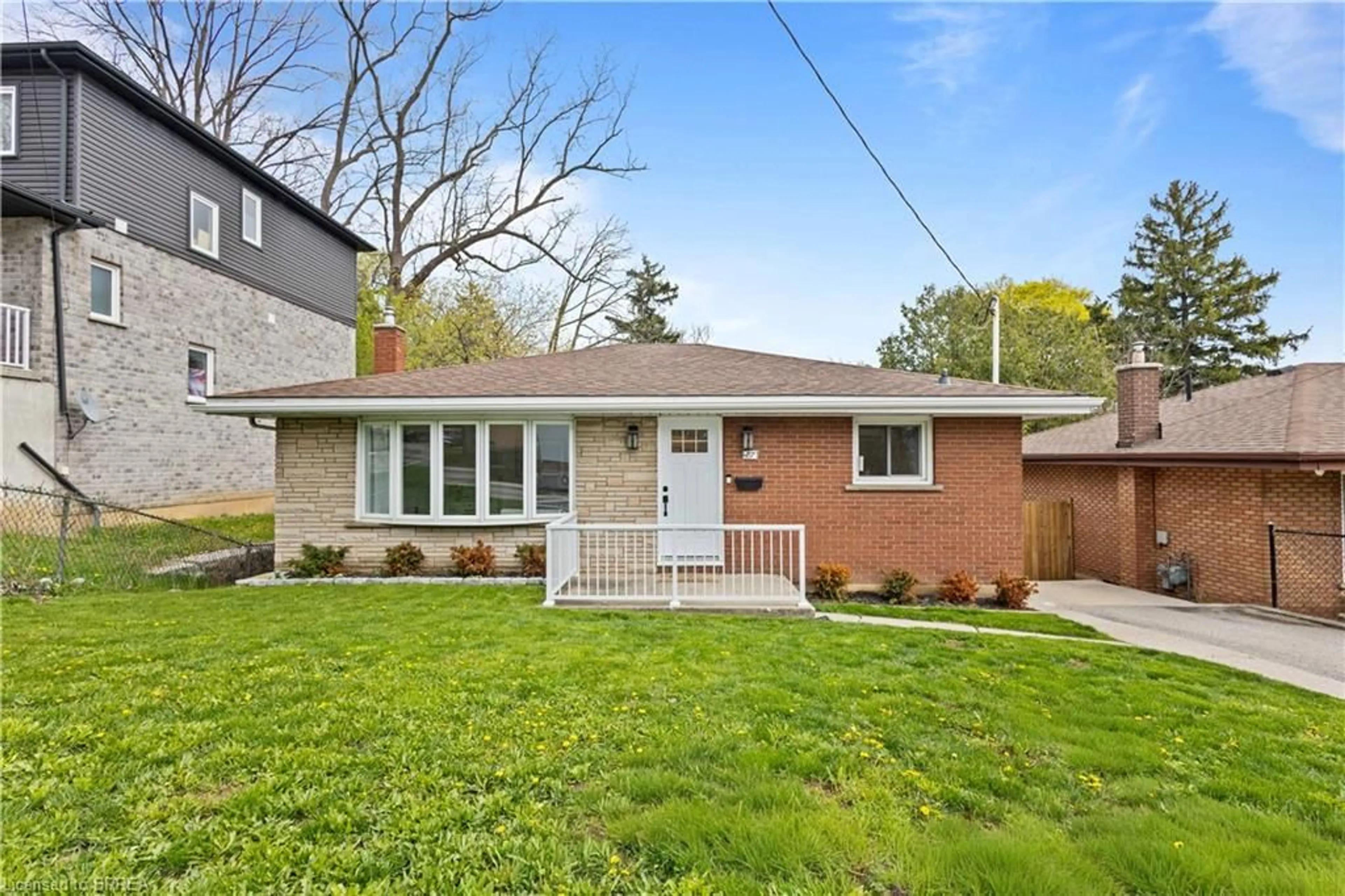 Home with brick exterior material, street for 87 St Paul Ave, Brantford Ontario N3T 4G1
