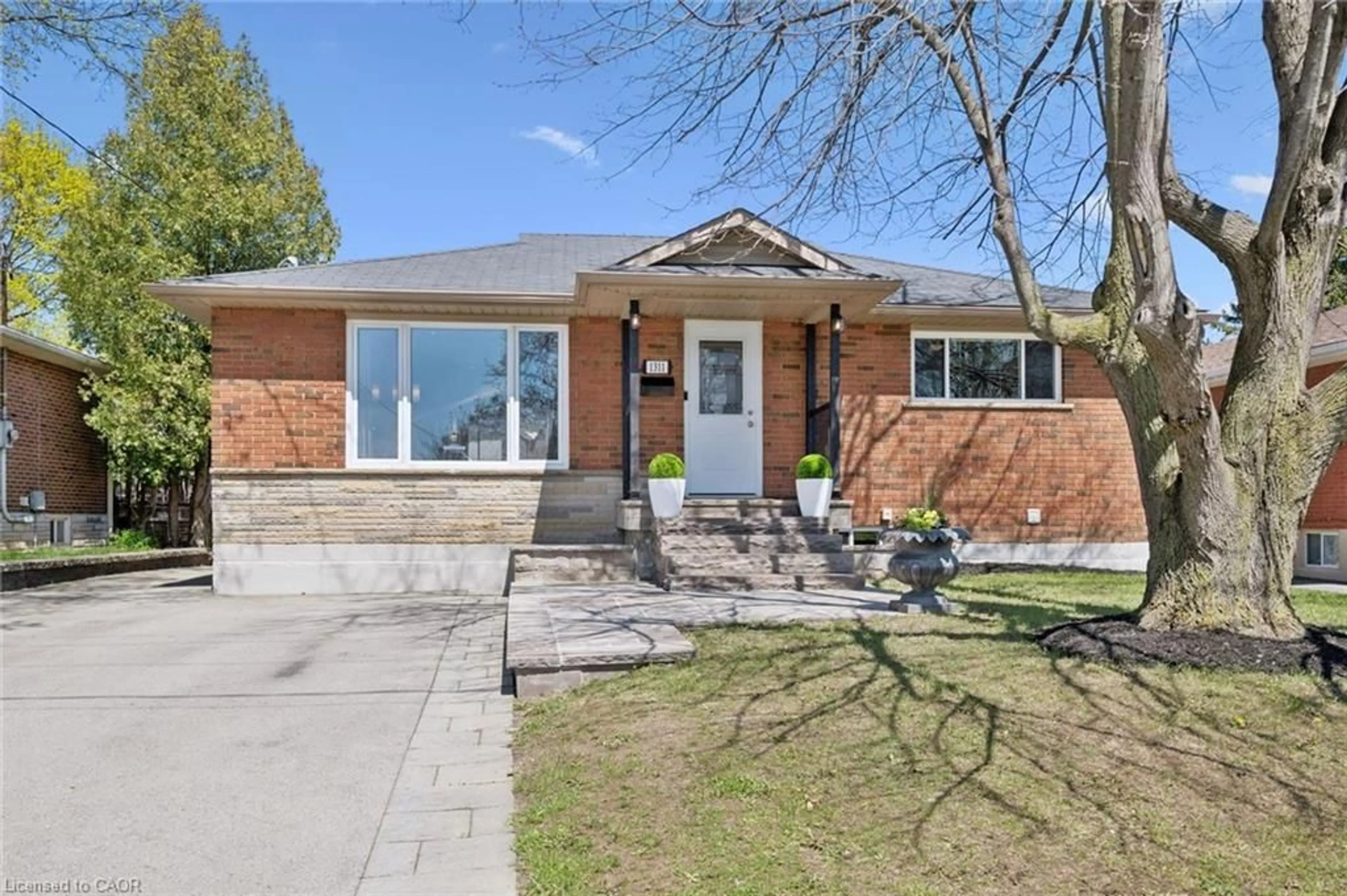 Home with brick exterior material, street for 1311 Royal Dr, Burlington Ontario L7P 2G2